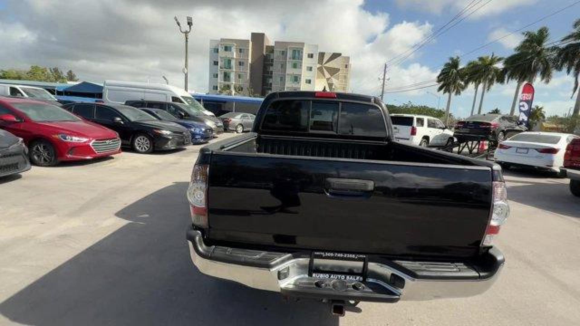 2014 Black Toyota Tacoma (5TFJU4GN3EX) with an 6 4.0 L engine, Automatic transmission, located at 27610 S Dixie Hwy, Homestead, FL, 33032, (305) 749-2348, 25.510241, -80.438301 - KBB.com Best Resale Value Awards. Only 104,374 Miles! Delivers 21 Highway MPG and 17 City MPG! This Toyota Tacoma boasts a Regular Unleaded V-6 4.0 L/241 engine powering this Automatic transmission. Wheels: 16 x 7J+30 Style Steel, Urethane Gear Shifter Material, Transmission: 5-Speed Automatic w/ECT - Photo#3