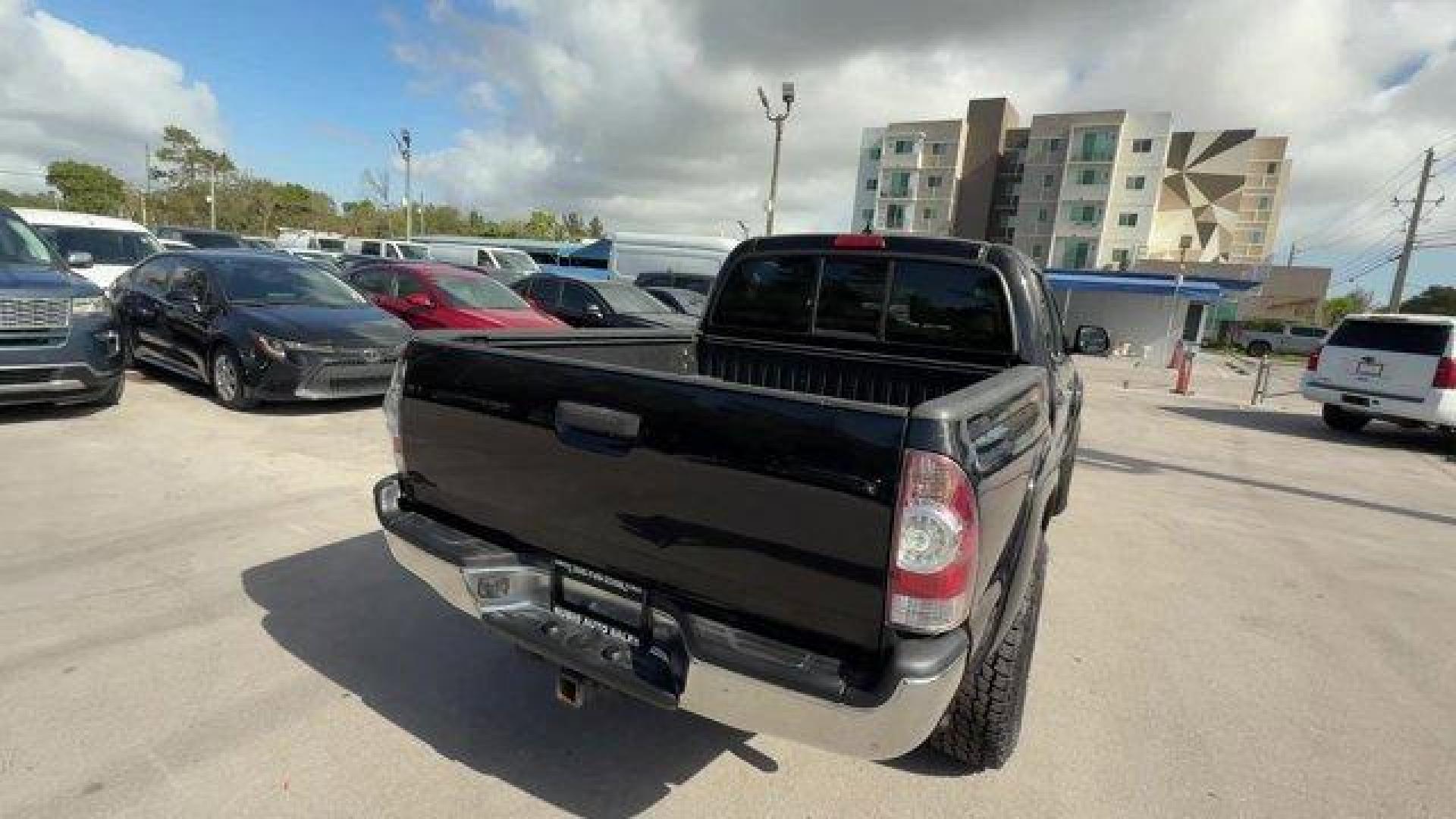 2014 Black Toyota Tacoma (5TFJU4GN3EX) with an 6 4.0 L engine, Automatic transmission, located at 27610 S Dixie Hwy, Homestead, FL, 33032, (305) 749-2348, 25.510241, -80.438301 - KBB.com Best Resale Value Awards. Only 104,374 Miles! Delivers 21 Highway MPG and 17 City MPG! This Toyota Tacoma boasts a Regular Unleaded V-6 4.0 L/241 engine powering this Automatic transmission. Wheels: 16 x 7J+30 Style Steel, Urethane Gear Shifter Material, Transmission: 5-Speed Automatic w/ECT - Photo#4