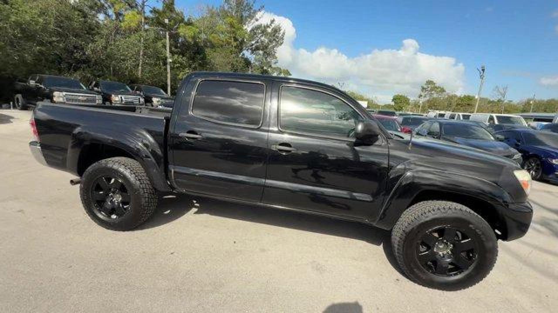 2014 Black Toyota Tacoma (5TFJU4GN3EX) with an 6 4.0 L engine, Automatic transmission, located at 27610 S Dixie Hwy, Homestead, FL, 33032, (305) 749-2348, 25.510241, -80.438301 - KBB.com Best Resale Value Awards. Only 104,374 Miles! Delivers 21 Highway MPG and 17 City MPG! This Toyota Tacoma boasts a Regular Unleaded V-6 4.0 L/241 engine powering this Automatic transmission. Wheels: 16 x 7J+30 Style Steel, Urethane Gear Shifter Material, Transmission: 5-Speed Automatic w/ECT - Photo#5