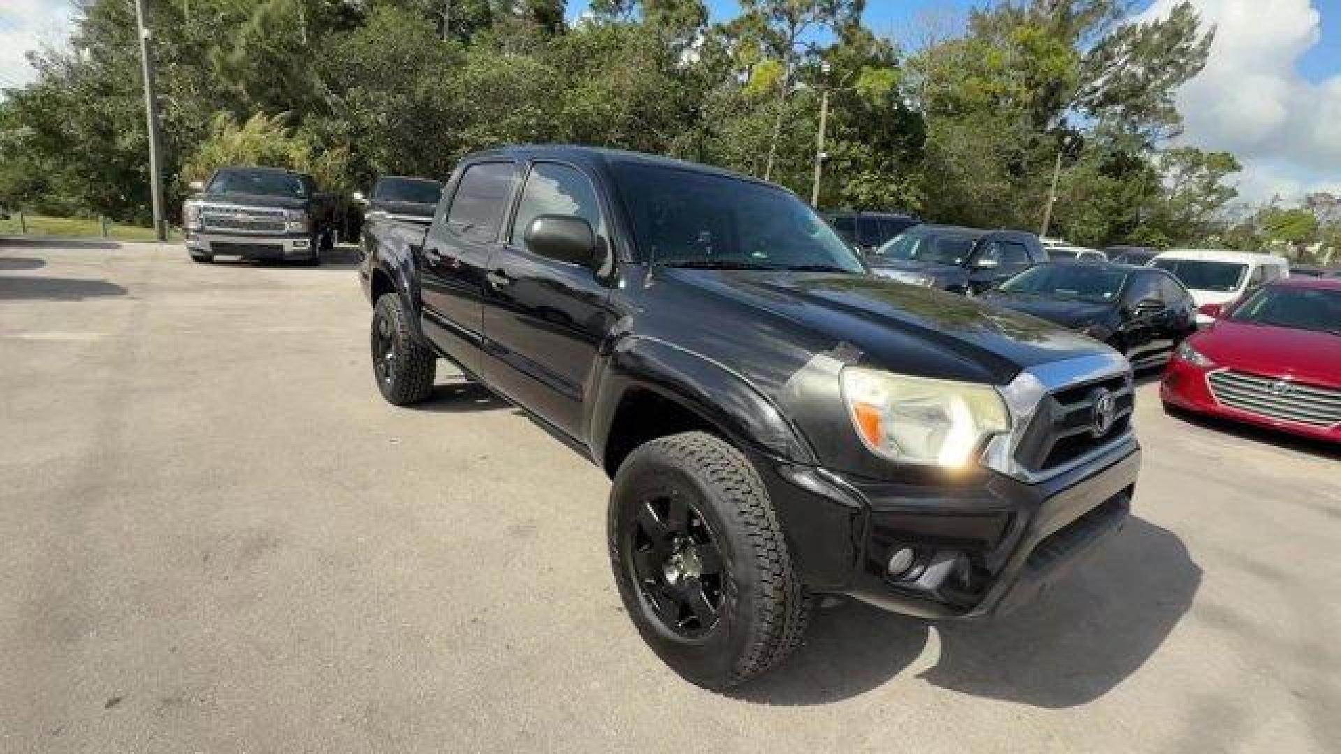 2014 Black Toyota Tacoma (5TFJU4GN3EX) with an 6 4.0 L engine, Automatic transmission, located at 27610 S Dixie Hwy, Homestead, FL, 33032, (305) 749-2348, 25.510241, -80.438301 - KBB.com Best Resale Value Awards. Only 104,374 Miles! Delivers 21 Highway MPG and 17 City MPG! This Toyota Tacoma boasts a Regular Unleaded V-6 4.0 L/241 engine powering this Automatic transmission. Wheels: 16 x 7J+30 Style Steel, Urethane Gear Shifter Material, Transmission: 5-Speed Automatic w/ECT - Photo#6