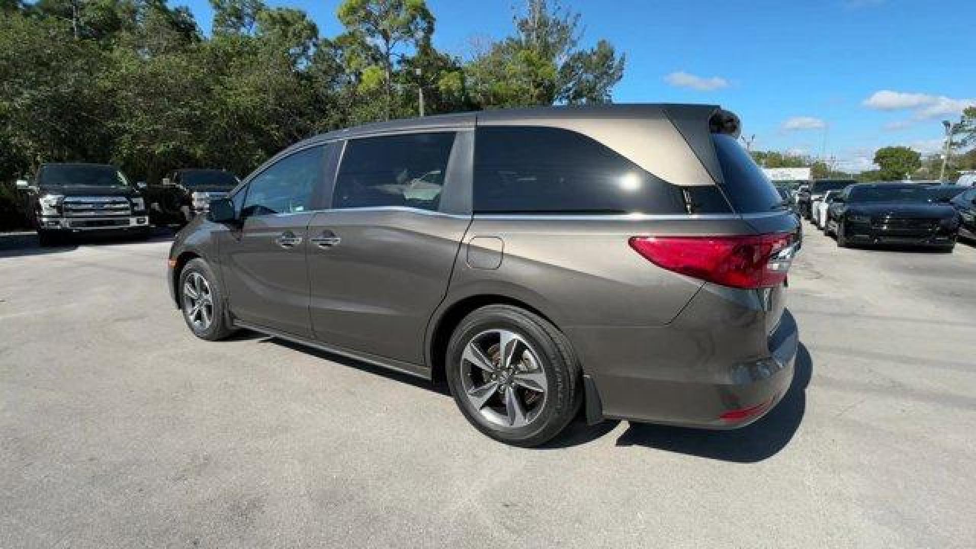 2020 Gray Honda Odyssey (5FNRL6H89LB) with an 6 3.5 L engine, Automatic transmission, located at 27610 S Dixie Hwy, Homestead, FL, 33032, (305) 749-2348, 25.510241, -80.438301 - ALG Residual Value Awards, Residual Value Awards. Delivers 28 Highway MPG and 19 City MPG! This Honda Odyssey boasts a Regular Unleaded V-6 3.5 L/212 engine powering this Automatic transmission. Wheels: 18 Machine-Finished Alloy -inc: dark gray insert, VSA Electronic Stability Control (ESC), Vinyl D - Photo#2