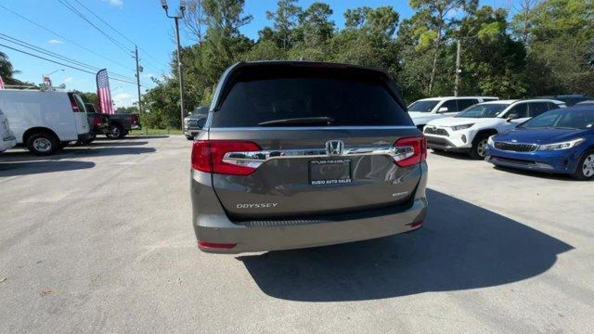 2020 Gray Honda Odyssey (5FNRL6H89LB) with an 6 3.5 L engine, Automatic transmission, located at 27610 S Dixie Hwy, Homestead, FL, 33032, (305) 749-2348, 25.510241, -80.438301 - ALG Residual Value Awards, Residual Value Awards. Delivers 28 Highway MPG and 19 City MPG! This Honda Odyssey boasts a Regular Unleaded V-6 3.5 L/212 engine powering this Automatic transmission. Wheels: 18 Machine-Finished Alloy -inc: dark gray insert, VSA Electronic Stability Control (ESC), Vinyl D - Photo#3