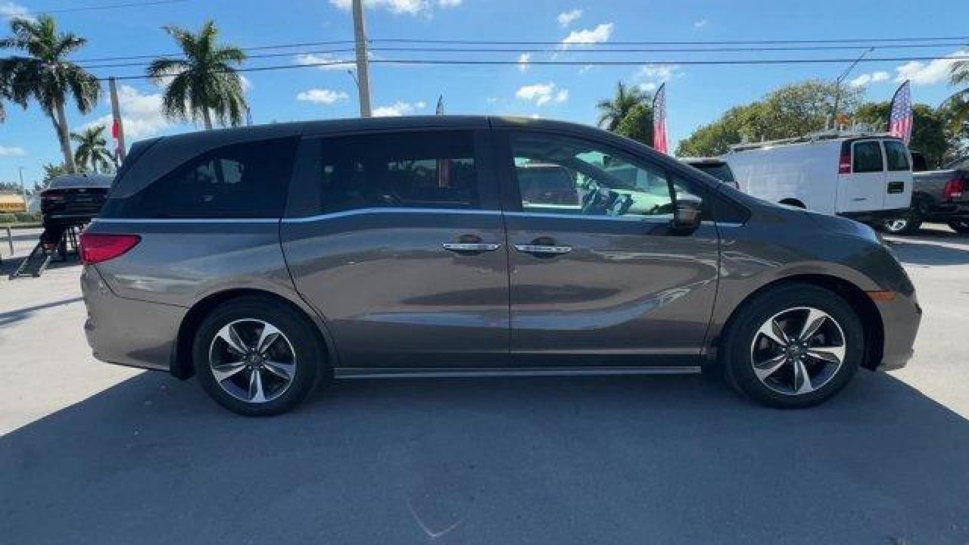 2020 Gray Honda Odyssey (5FNRL6H89LB) with an 6 3.5 L engine, Automatic transmission, located at 27610 S Dixie Hwy, Homestead, FL, 33032, (305) 749-2348, 25.510241, -80.438301 - ALG Residual Value Awards, Residual Value Awards. Delivers 28 Highway MPG and 19 City MPG! This Honda Odyssey boasts a Regular Unleaded V-6 3.5 L/212 engine powering this Automatic transmission. Wheels: 18 Machine-Finished Alloy -inc: dark gray insert, VSA Electronic Stability Control (ESC), Vinyl D - Photo#5