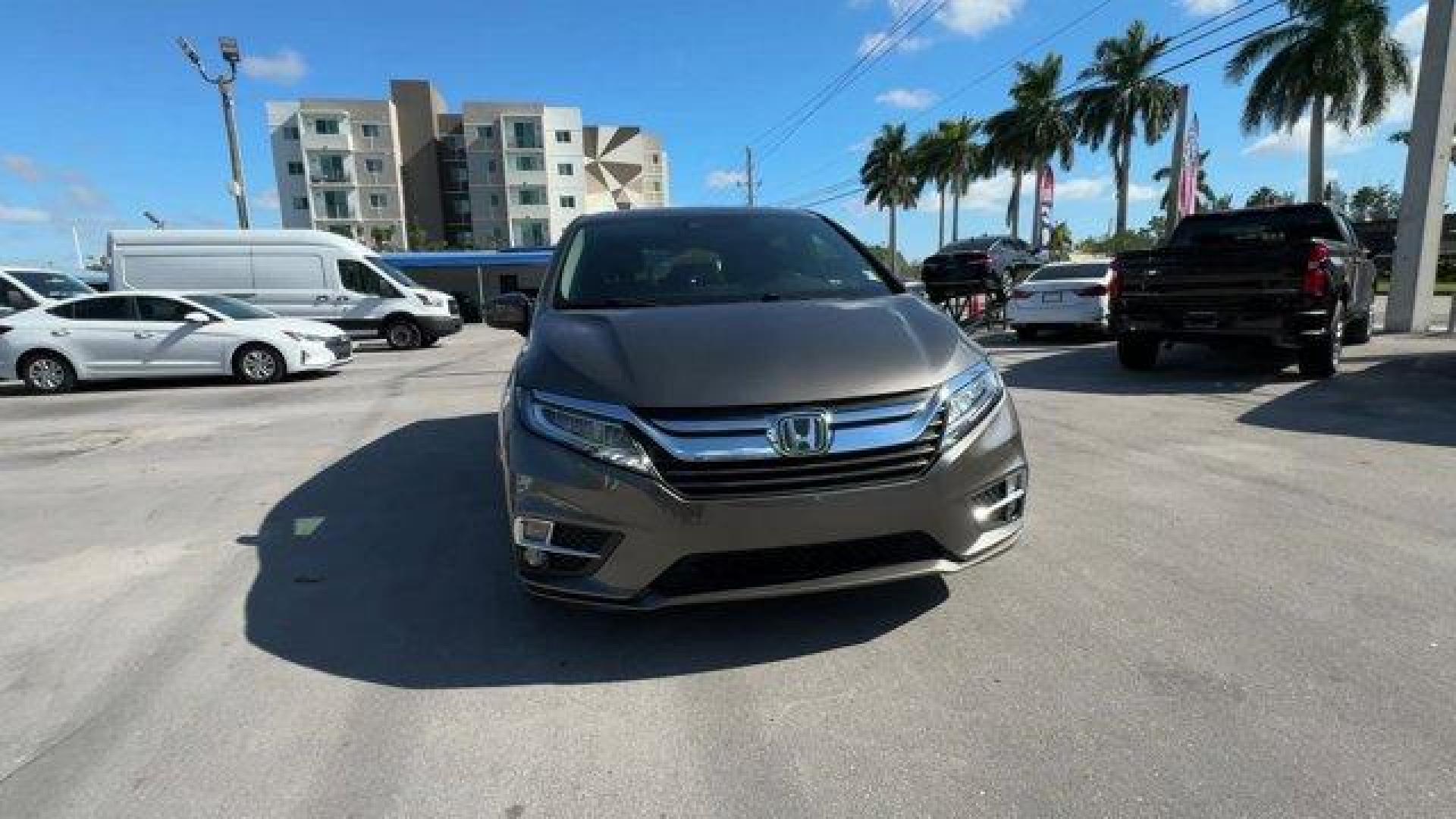 2020 Gray Honda Odyssey (5FNRL6H89LB) with an 6 3.5 L engine, Automatic transmission, located at 27610 S Dixie Hwy, Homestead, FL, 33032, (305) 749-2348, 25.510241, -80.438301 - ALG Residual Value Awards, Residual Value Awards. Delivers 28 Highway MPG and 19 City MPG! This Honda Odyssey boasts a Regular Unleaded V-6 3.5 L/212 engine powering this Automatic transmission. Wheels: 18 Machine-Finished Alloy -inc: dark gray insert, VSA Electronic Stability Control (ESC), Vinyl D - Photo#7