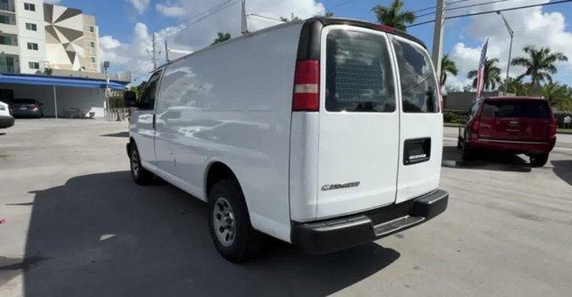 2013 Summit White /Medium Pewter Chevrolet Express Cargo Van (1GCSGAFX1D1) with an 6 4.3L engine, Automatic transmission, located at 27610 S Dixie Hwy, Homestead, FL, 33032, (305) 749-2348, 25.510241, -80.438301 - Delivers 20 Highway MPG and 15 City MPG! This Chevrolet Express Cargo Van delivers a Gas V6 4.3L/262 engine powering this Automatic transmission. TRANSMISSION, 4-SPEED AUTOMATIC, ELECTRONICALLY CONTROLLED with overdrive, tow/haul mode and internal transmission oil cooler (STD), TIRE, SPARE P245/70R1 - Photo#4