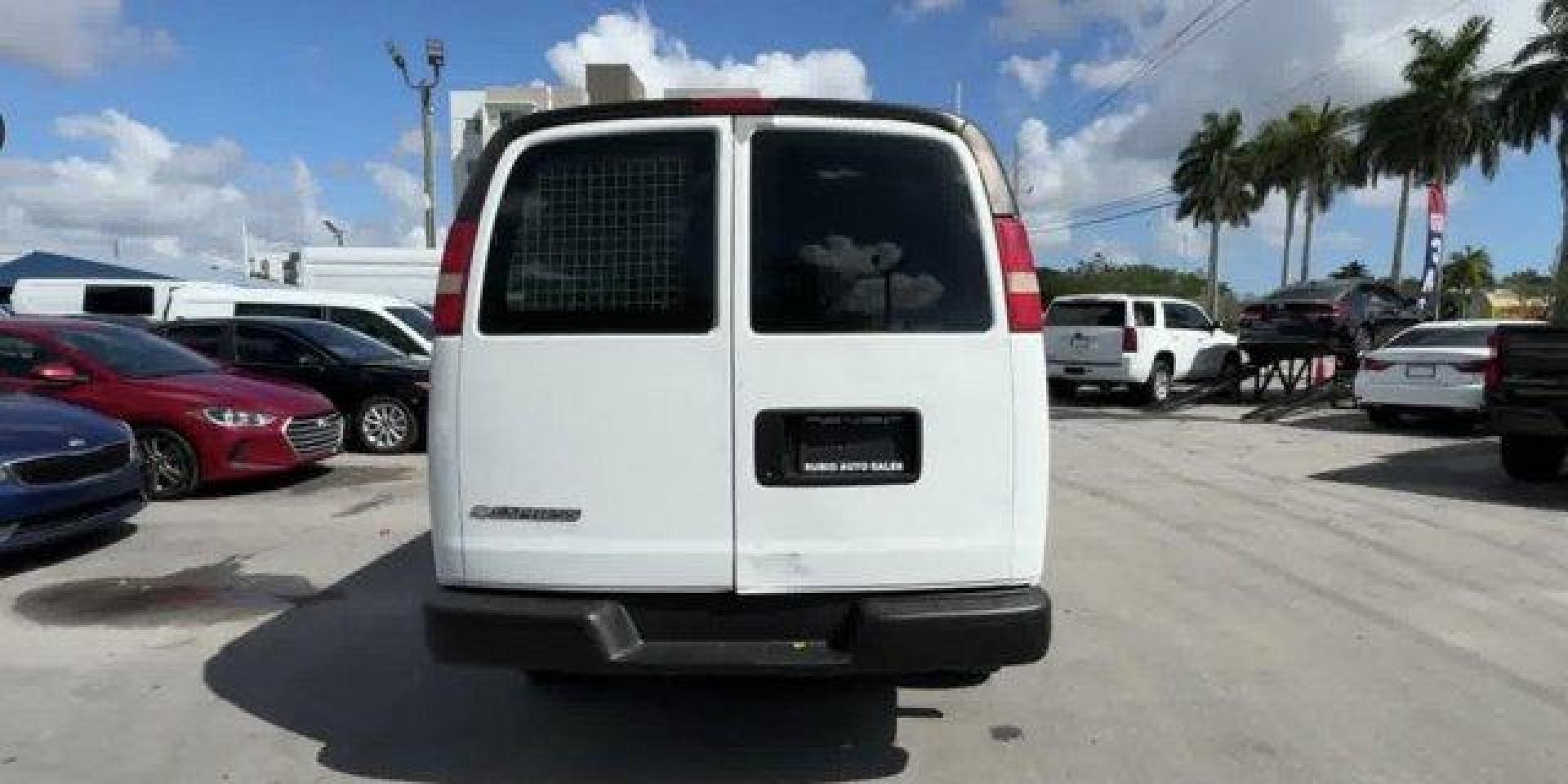 2013 Summit White /Medium Pewter Chevrolet Express Cargo Van (1GCSGAFX1D1) with an 6 4.3L engine, Automatic transmission, located at 27610 S Dixie Hwy, Homestead, FL, 33032, (305) 749-2348, 25.510241, -80.438301 - Delivers 20 Highway MPG and 15 City MPG! This Chevrolet Express Cargo Van delivers a Gas V6 4.3L/262 engine powering this Automatic transmission. TRANSMISSION, 4-SPEED AUTOMATIC, ELECTRONICALLY CONTROLLED with overdrive, tow/haul mode and internal transmission oil cooler (STD), TIRE, SPARE P245/70R1 - Photo#5