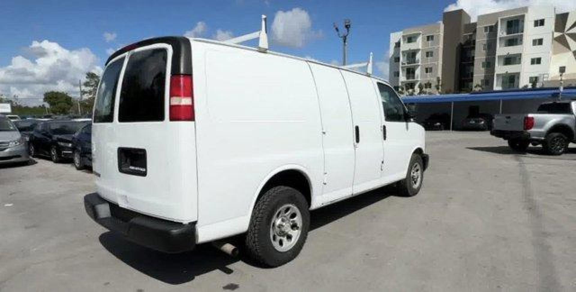 2013 Summit White /Medium Pewter Chevrolet Express Cargo Van (1GCSGAFX1D1) with an 6 4.3L engine, Automatic transmission, located at 27610 S Dixie Hwy, Homestead, FL, 33032, (305) 749-2348, 25.510241, -80.438301 - Delivers 20 Highway MPG and 15 City MPG! This Chevrolet Express Cargo Van delivers a Gas V6 4.3L/262 engine powering this Automatic transmission. TRANSMISSION, 4-SPEED AUTOMATIC, ELECTRONICALLY CONTROLLED with overdrive, tow/haul mode and internal transmission oil cooler (STD), TIRE, SPARE P245/70R1 - Photo#6