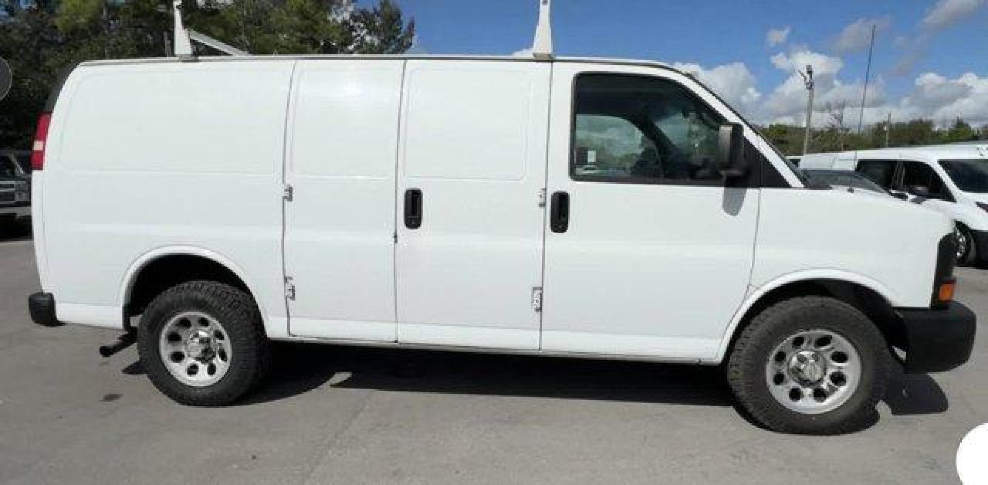 2013 Summit White /Medium Pewter Chevrolet Express Cargo Van (1GCSGAFX1D1) with an 6 4.3L engine, Automatic transmission, located at 27610 S Dixie Hwy, Homestead, FL, 33032, (305) 749-2348, 25.510241, -80.438301 - Delivers 20 Highway MPG and 15 City MPG! This Chevrolet Express Cargo Van delivers a Gas V6 4.3L/262 engine powering this Automatic transmission. TRANSMISSION, 4-SPEED AUTOMATIC, ELECTRONICALLY CONTROLLED with overdrive, tow/haul mode and internal transmission oil cooler (STD), TIRE, SPARE P245/70R1 - Photo#7