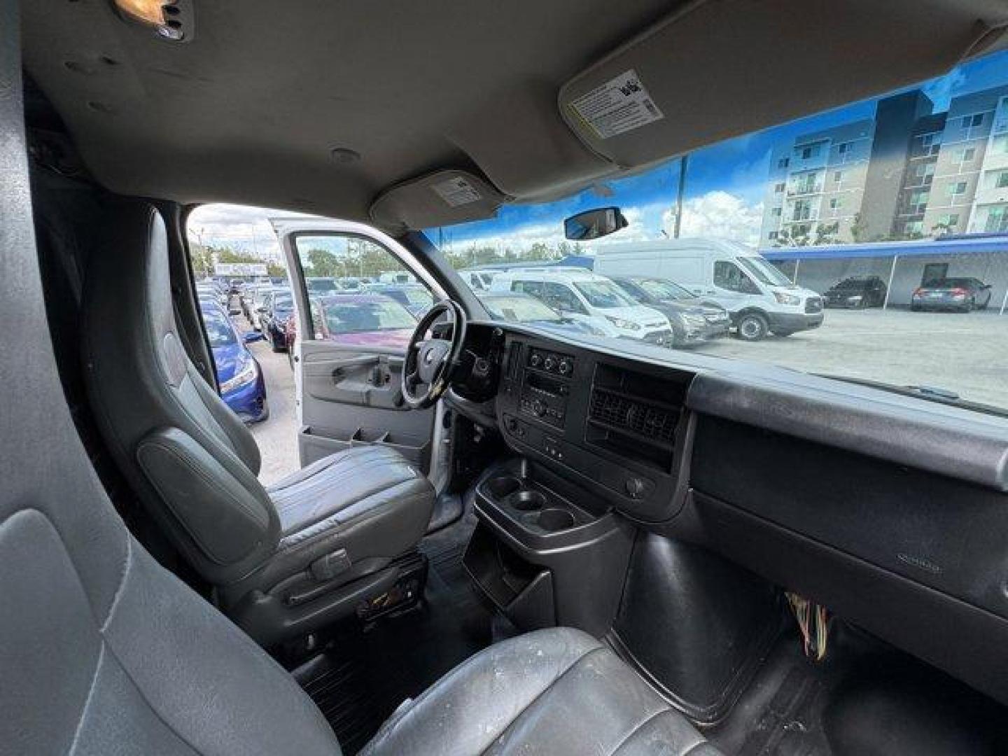 2013 Summit White /Medium Pewter Chevrolet Express Cargo Van (1GCSGAFX1D1) with an 6 4.3L engine, Automatic transmission, located at 27610 S Dixie Hwy, Homestead, FL, 33032, (305) 749-2348, 25.510241, -80.438301 - Delivers 20 Highway MPG and 15 City MPG! This Chevrolet Express Cargo Van delivers a Gas V6 4.3L/262 engine powering this Automatic transmission. TRANSMISSION, 4-SPEED AUTOMATIC, ELECTRONICALLY CONTROLLED with overdrive, tow/haul mode and internal transmission oil cooler (STD), TIRE, SPARE P245/70R1 - Photo#11