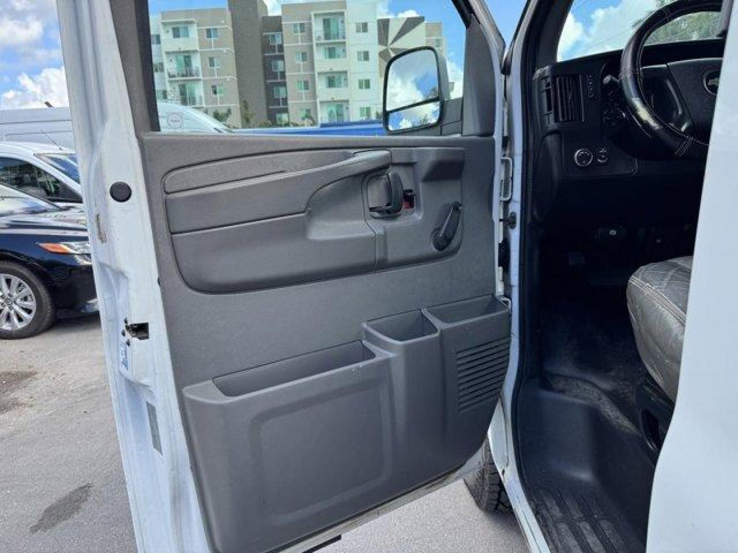 2013 Summit White /Medium Pewter Chevrolet Express Cargo Van (1GCSGAFX1D1) with an 6 4.3L engine, Automatic transmission, located at 27610 S Dixie Hwy, Homestead, FL, 33032, (305) 749-2348, 25.510241, -80.438301 - Delivers 20 Highway MPG and 15 City MPG! This Chevrolet Express Cargo Van delivers a Gas V6 4.3L/262 engine powering this Automatic transmission. TRANSMISSION, 4-SPEED AUTOMATIC, ELECTRONICALLY CONTROLLED with overdrive, tow/haul mode and internal transmission oil cooler (STD), TIRE, SPARE P245/70R1 - Photo#13