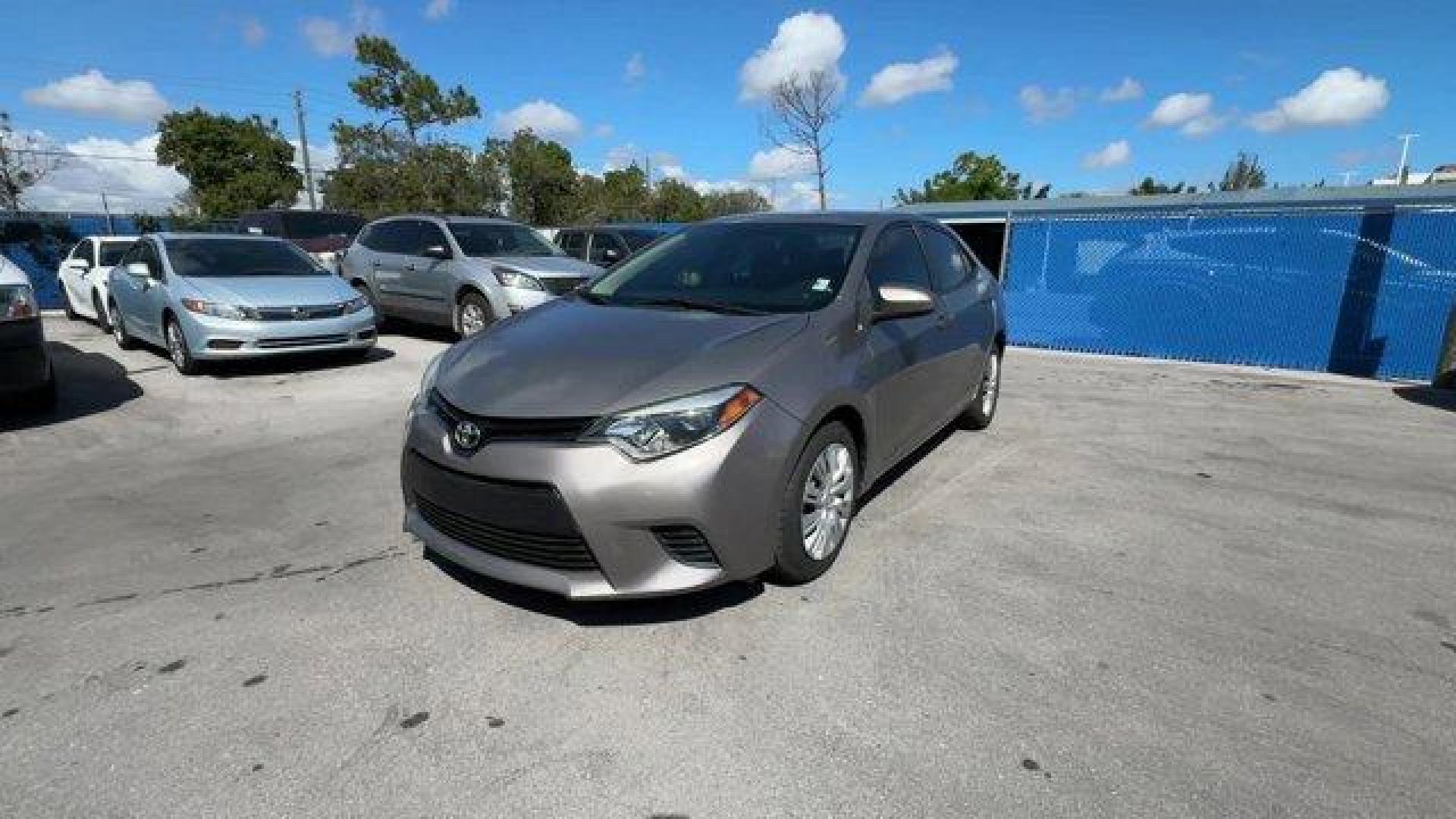 2014 Gray Toyota Corolla (2T1BURHE1EC) with an 4 1.8 L engine, Automatic transmission, located at 27610 S Dixie Hwy, Homestead, FL, 33032, (305) 749-2348, 25.510241, -80.438301 - KBB.com 10 Tech-Savviest Cars Under $20,000. This Toyota Corolla delivers a Regular Unleaded I-4 1.8 L/110 engine powering this Automatic transmission. Window Grid Antenna, Urethane Gear Shifter Material, Trunk Rear Cargo Access.*This Toyota Corolla Comes Equipped with These Options *Trip Computer, - Photo#0