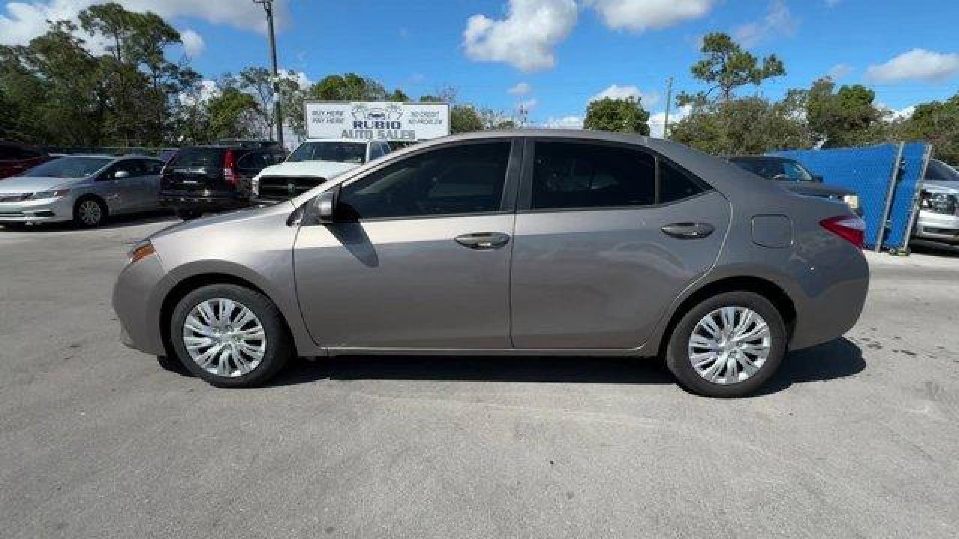 2014 Gray Toyota Corolla (2T1BURHE1EC) with an 4 1.8 L engine, Automatic transmission, located at 27610 S Dixie Hwy, Homestead, FL, 33032, (305) 749-2348, 25.510241, -80.438301 - KBB.com 10 Tech-Savviest Cars Under $20,000. This Toyota Corolla delivers a Regular Unleaded I-4 1.8 L/110 engine powering this Automatic transmission. Window Grid Antenna, Urethane Gear Shifter Material, Trunk Rear Cargo Access.*This Toyota Corolla Comes Equipped with These Options *Trip Computer, - Photo#1