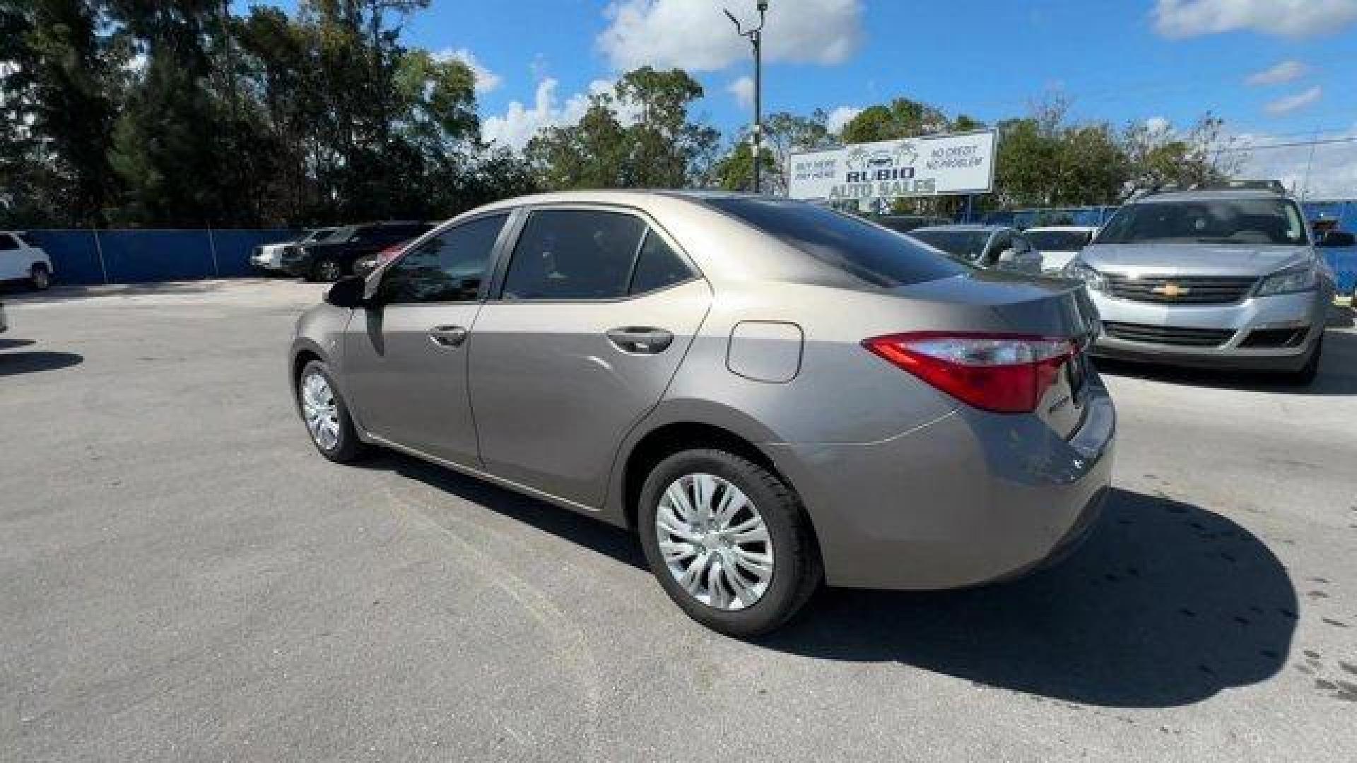 2014 Gray Toyota Corolla (2T1BURHE1EC) with an 4 1.8 L engine, Automatic transmission, located at 27610 S Dixie Hwy, Homestead, FL, 33032, (305) 749-2348, 25.510241, -80.438301 - KBB.com 10 Tech-Savviest Cars Under $20,000. This Toyota Corolla delivers a Regular Unleaded I-4 1.8 L/110 engine powering this Automatic transmission. Window Grid Antenna, Urethane Gear Shifter Material, Trunk Rear Cargo Access.*This Toyota Corolla Comes Equipped with These Options *Trip Computer, - Photo#2