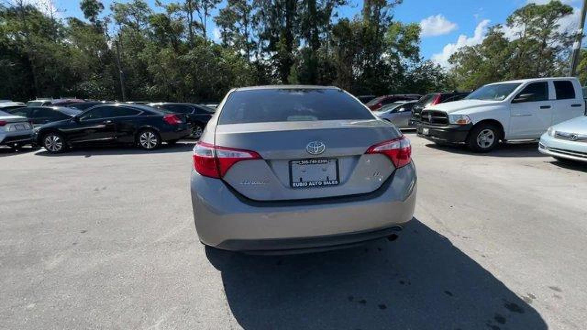 2014 Gray Toyota Corolla (2T1BURHE1EC) with an 4 1.8 L engine, Automatic transmission, located at 27610 S Dixie Hwy, Homestead, FL, 33032, (305) 749-2348, 25.510241, -80.438301 - KBB.com 10 Tech-Savviest Cars Under $20,000. This Toyota Corolla delivers a Regular Unleaded I-4 1.8 L/110 engine powering this Automatic transmission. Window Grid Antenna, Urethane Gear Shifter Material, Trunk Rear Cargo Access.*This Toyota Corolla Comes Equipped with These Options *Trip Computer, - Photo#3