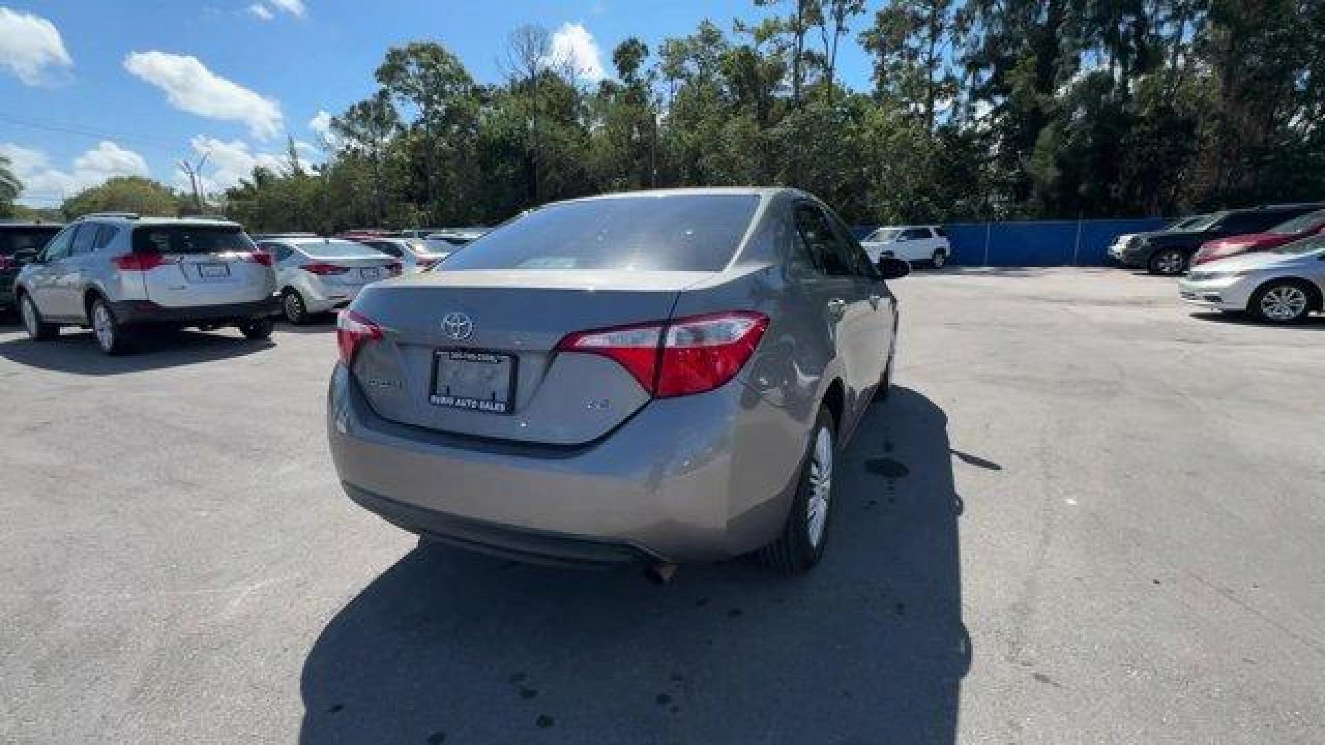 2014 Gray Toyota Corolla (2T1BURHE1EC) with an 4 1.8 L engine, Automatic transmission, located at 27610 S Dixie Hwy, Homestead, FL, 33032, (305) 749-2348, 25.510241, -80.438301 - KBB.com 10 Tech-Savviest Cars Under $20,000. This Toyota Corolla delivers a Regular Unleaded I-4 1.8 L/110 engine powering this Automatic transmission. Window Grid Antenna, Urethane Gear Shifter Material, Trunk Rear Cargo Access.*This Toyota Corolla Comes Equipped with These Options *Trip Computer, - Photo#4