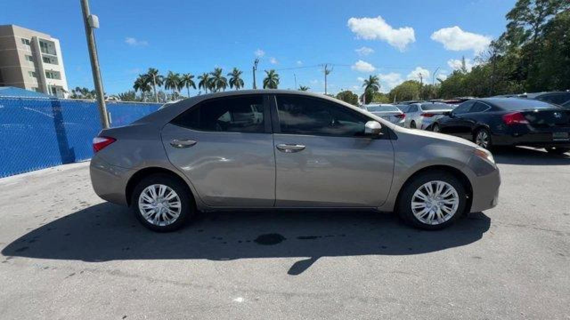 2014 Gray Toyota Corolla (2T1BURHE1EC) with an 4 1.8 L engine, Automatic transmission, located at 27610 S Dixie Hwy, Homestead, FL, 33032, (305) 749-2348, 25.510241, -80.438301 - KBB.com 10 Tech-Savviest Cars Under $20,000. This Toyota Corolla delivers a Regular Unleaded I-4 1.8 L/110 engine powering this Automatic transmission. Window Grid Antenna, Urethane Gear Shifter Material, Trunk Rear Cargo Access.*This Toyota Corolla Comes Equipped with These Options *Trip Computer, - Photo#5