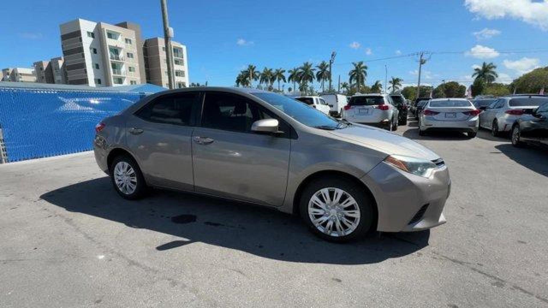 2014 Gray Toyota Corolla (2T1BURHE1EC) with an 4 1.8 L engine, Automatic transmission, located at 27610 S Dixie Hwy, Homestead, FL, 33032, (305) 749-2348, 25.510241, -80.438301 - KBB.com 10 Tech-Savviest Cars Under $20,000. This Toyota Corolla delivers a Regular Unleaded I-4 1.8 L/110 engine powering this Automatic transmission. Window Grid Antenna, Urethane Gear Shifter Material, Trunk Rear Cargo Access.*This Toyota Corolla Comes Equipped with These Options *Trip Computer, - Photo#6