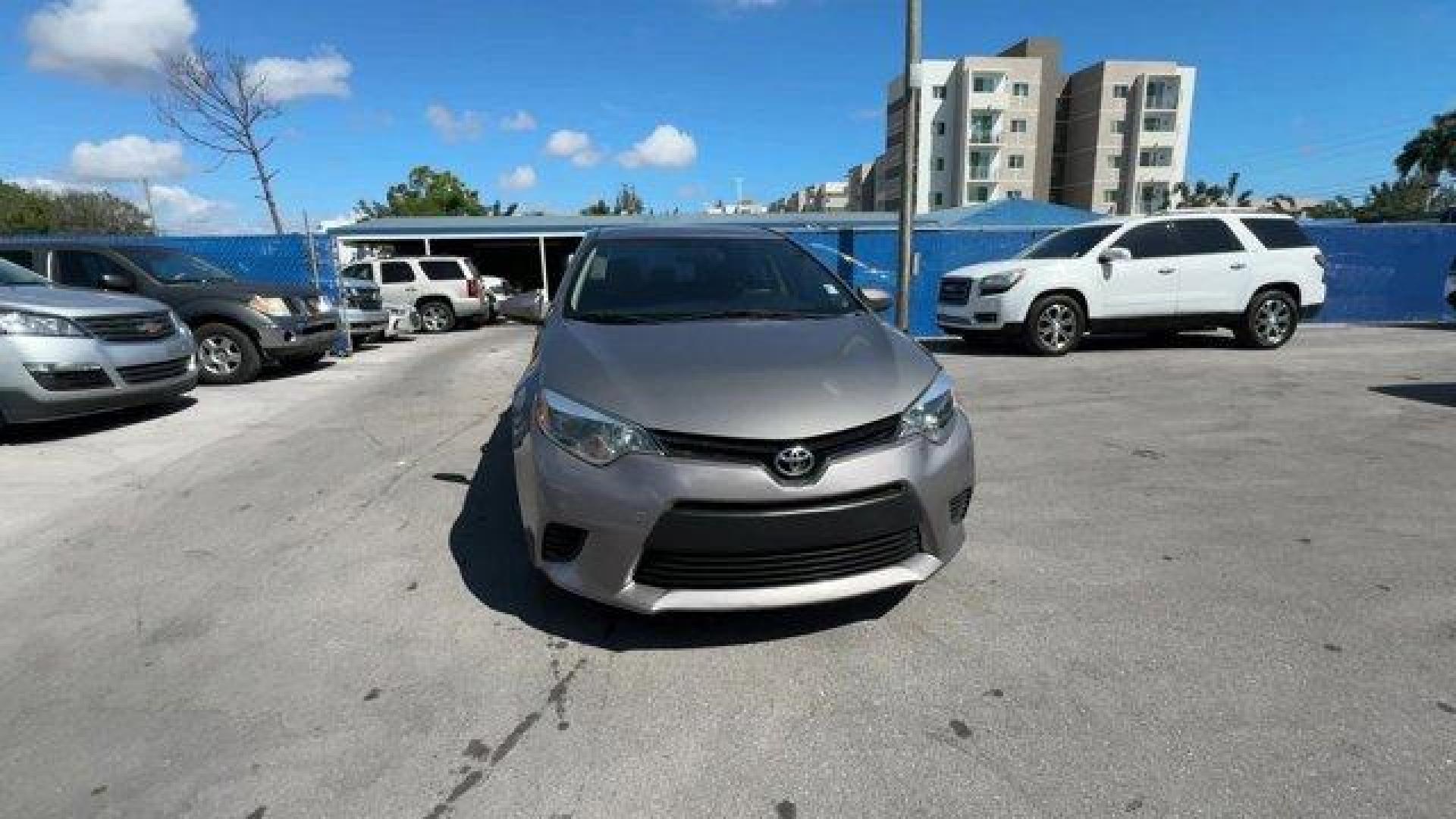 2014 Gray Toyota Corolla (2T1BURHE1EC) with an 4 1.8 L engine, Automatic transmission, located at 27610 S Dixie Hwy, Homestead, FL, 33032, (305) 749-2348, 25.510241, -80.438301 - KBB.com 10 Tech-Savviest Cars Under $20,000. This Toyota Corolla delivers a Regular Unleaded I-4 1.8 L/110 engine powering this Automatic transmission. Window Grid Antenna, Urethane Gear Shifter Material, Trunk Rear Cargo Access.*This Toyota Corolla Comes Equipped with These Options *Trip Computer, - Photo#7