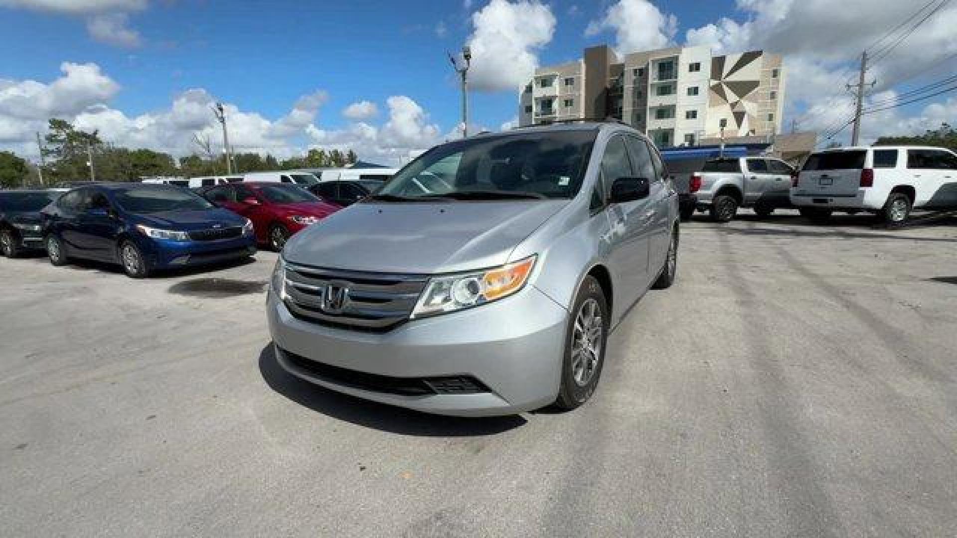 2012 Silver Honda Odyssey (5FNRL5H64CB) with an 6 3.5L engine, Automatic transmission, located at 27610 S Dixie Hwy, Homestead, FL, 33032, (305) 749-2348, 25.510241, -80.438301 - KBB.com 10 Best Used Family Cars Under $15,000. Scores 27 Highway MPG and 18 City MPG! This Honda Odyssey delivers a Gas V6 3.5L/212 engine powering this Automatic transmission. XM Radio (subscription required), Wide-mode adjustable 2nd-row seats -inc: leather trimmed outboard seats, multi-function - Photo#0