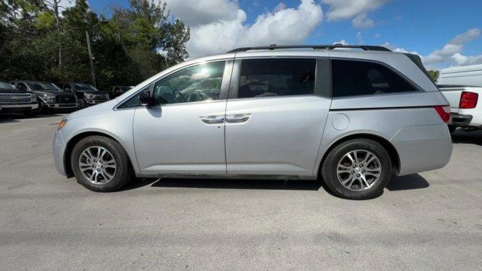 2012 Silver Honda Odyssey (5FNRL5H64CB) with an 6 3.5L engine, Automatic transmission, located at 27610 S Dixie Hwy, Homestead, FL, 33032, (305) 749-2348, 25.510241, -80.438301 - KBB.com 10 Best Used Family Cars Under $15,000. Scores 27 Highway MPG and 18 City MPG! This Honda Odyssey delivers a Gas V6 3.5L/212 engine powering this Automatic transmission. XM Radio (subscription required), Wide-mode adjustable 2nd-row seats -inc: leather trimmed outboard seats, multi-function - Photo#1