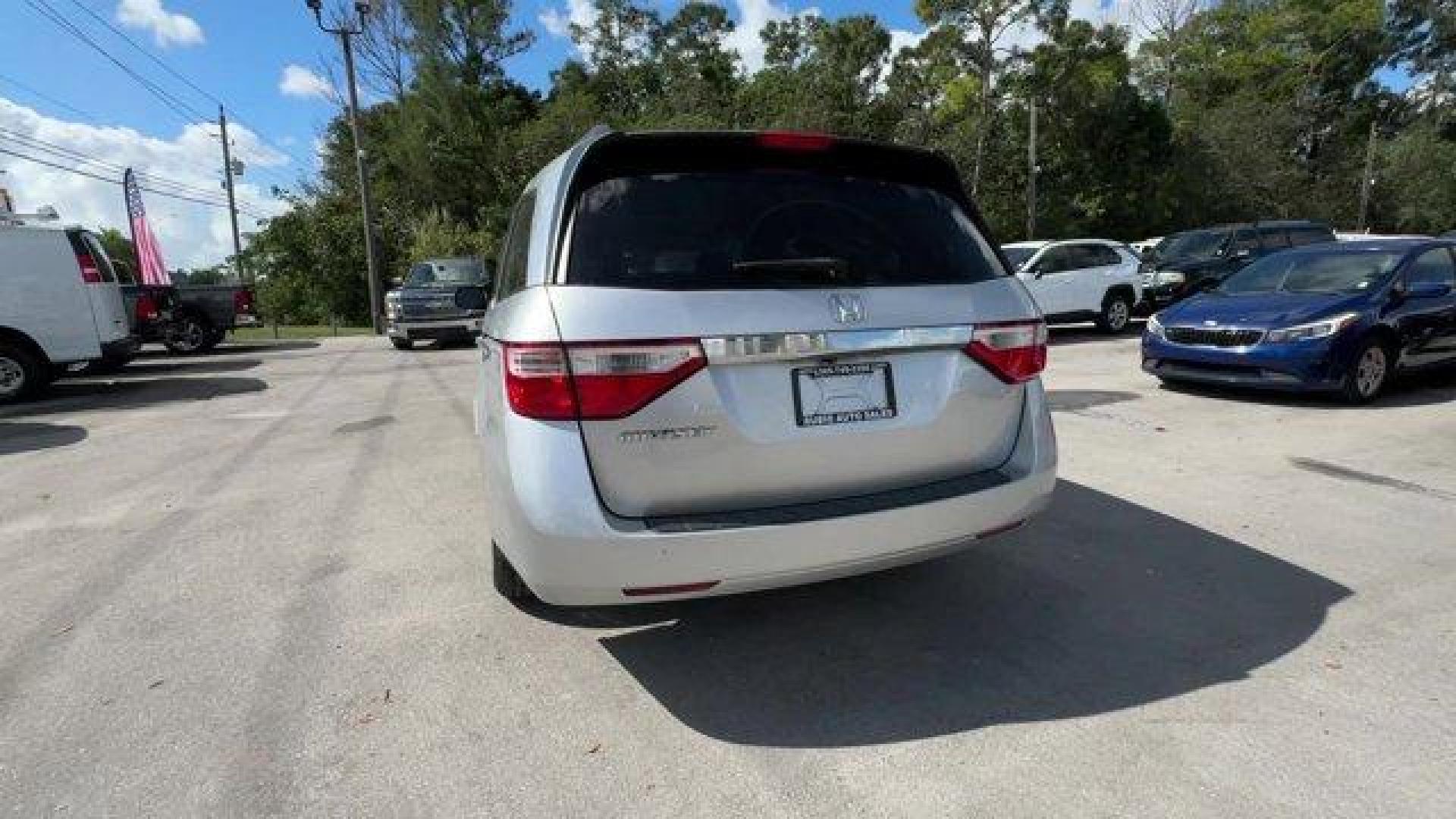 2012 Silver Honda Odyssey (5FNRL5H64CB) with an 6 3.5L engine, Automatic transmission, located at 27610 S Dixie Hwy, Homestead, FL, 33032, (305) 749-2348, 25.510241, -80.438301 - KBB.com 10 Best Used Family Cars Under $15,000. Scores 27 Highway MPG and 18 City MPG! This Honda Odyssey delivers a Gas V6 3.5L/212 engine powering this Automatic transmission. XM Radio (subscription required), Wide-mode adjustable 2nd-row seats -inc: leather trimmed outboard seats, multi-function - Photo#3