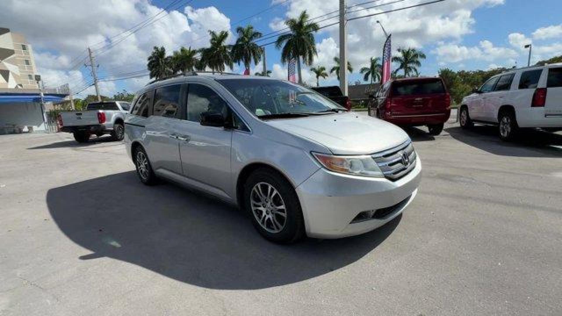 2012 Silver Honda Odyssey (5FNRL5H64CB) with an 6 3.5L engine, Automatic transmission, located at 27610 S Dixie Hwy, Homestead, FL, 33032, (305) 749-2348, 25.510241, -80.438301 - KBB.com 10 Best Used Family Cars Under $15,000. Scores 27 Highway MPG and 18 City MPG! This Honda Odyssey delivers a Gas V6 3.5L/212 engine powering this Automatic transmission. XM Radio (subscription required), Wide-mode adjustable 2nd-row seats -inc: leather trimmed outboard seats, multi-function - Photo#6