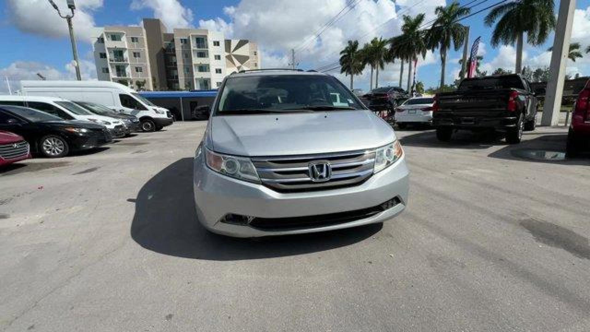 2012 Silver Honda Odyssey (5FNRL5H64CB) with an 6 3.5L engine, Automatic transmission, located at 27610 S Dixie Hwy, Homestead, FL, 33032, (305) 749-2348, 25.510241, -80.438301 - KBB.com 10 Best Used Family Cars Under $15,000. Scores 27 Highway MPG and 18 City MPG! This Honda Odyssey delivers a Gas V6 3.5L/212 engine powering this Automatic transmission. XM Radio (subscription required), Wide-mode adjustable 2nd-row seats -inc: leather trimmed outboard seats, multi-function - Photo#7