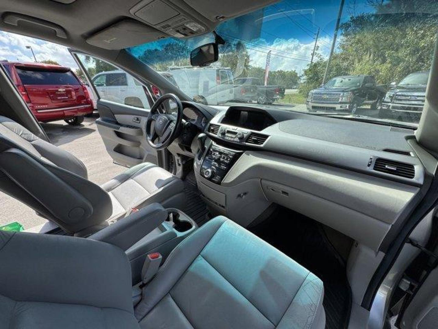 2012 Silver Honda Odyssey (5FNRL5H64CB) with an 6 3.5L engine, Automatic transmission, located at 27610 S Dixie Hwy, Homestead, FL, 33032, (305) 749-2348, 25.510241, -80.438301 - KBB.com 10 Best Used Family Cars Under $15,000. Scores 27 Highway MPG and 18 City MPG! This Honda Odyssey delivers a Gas V6 3.5L/212 engine powering this Automatic transmission. XM Radio (subscription required), Wide-mode adjustable 2nd-row seats -inc: leather trimmed outboard seats, multi-function - Photo#11