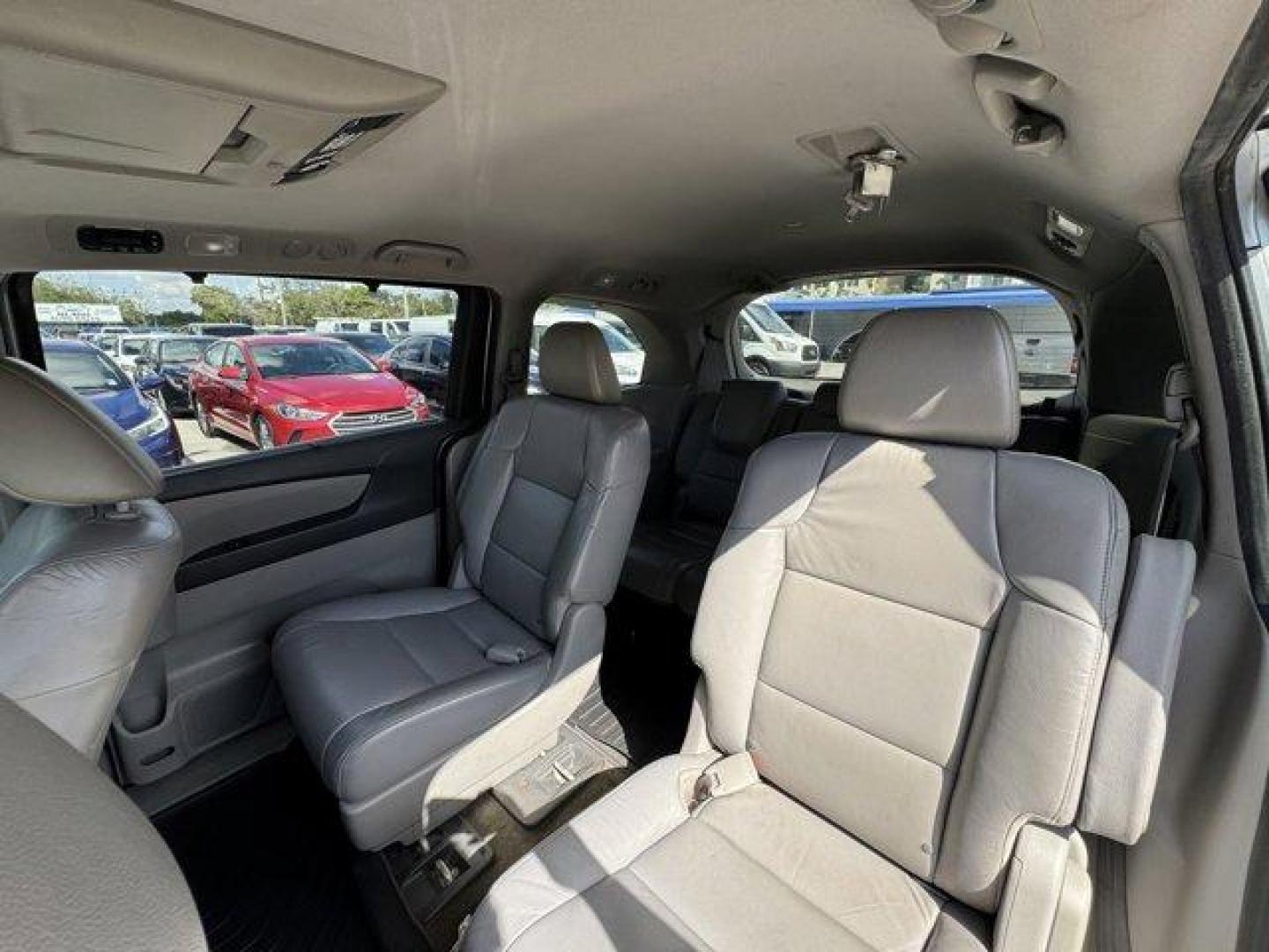 2012 Silver Honda Odyssey (5FNRL5H64CB) with an 6 3.5L engine, Automatic transmission, located at 27610 S Dixie Hwy, Homestead, FL, 33032, (305) 749-2348, 25.510241, -80.438301 - KBB.com 10 Best Used Family Cars Under $15,000. Scores 27 Highway MPG and 18 City MPG! This Honda Odyssey delivers a Gas V6 3.5L/212 engine powering this Automatic transmission. XM Radio (subscription required), Wide-mode adjustable 2nd-row seats -inc: leather trimmed outboard seats, multi-function - Photo#12