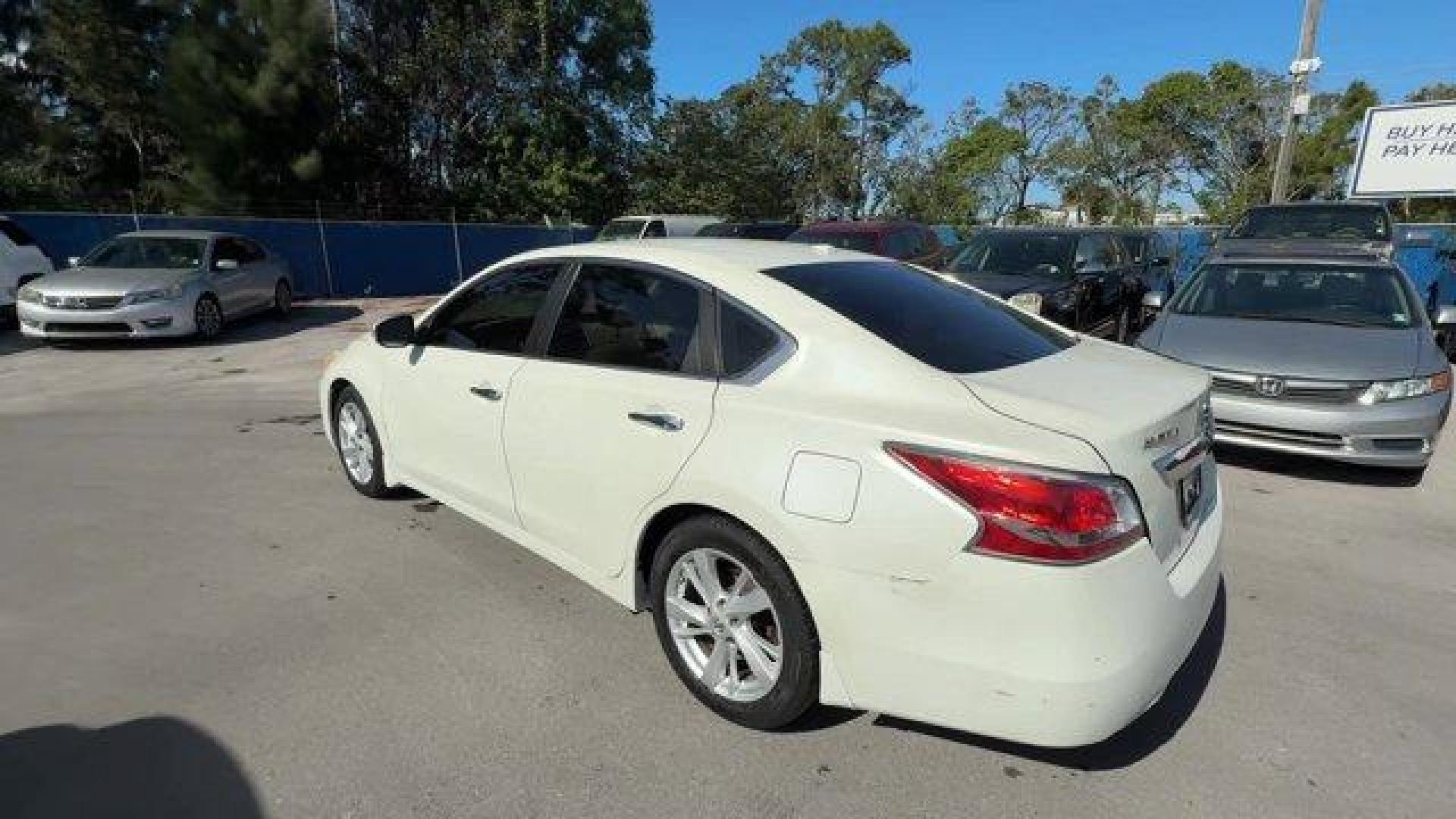 2015 Pearl White /Beige Nissan Altima (1N4AL3AP7FC) with an 4 2.5 L engine, Variable transmission, located at 27610 S Dixie Hwy, Homestead, FL, 33032, (305) 749-2348, 25.510241, -80.438301 - IIHS Top Safety Pick, Top Safety Pick+. Delivers 38 Highway MPG and 27 City MPG! This Nissan Altima boasts a Regular Unleaded I-4 2.5 L/152 engine powering this Variable transmission. PEARL WHITE, BEIGE, CLOTH SEAT TRIM, [Z66] ACTIVATION DISCLAIMER.*This Nissan Altima Comes Equipped with These Optio - Photo#0