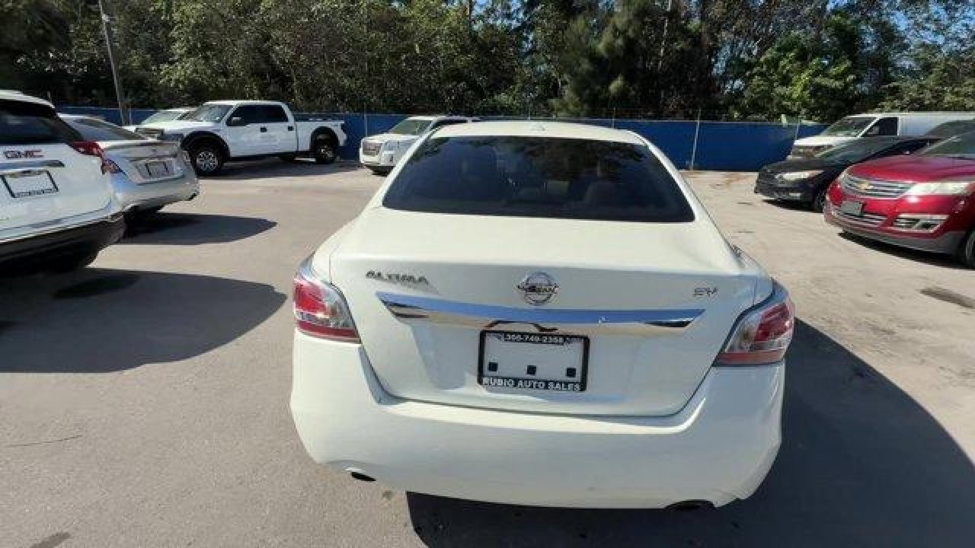 2015 Pearl White /Beige Nissan Altima (1N4AL3AP7FC) with an 4 2.5 L engine, Variable transmission, located at 27610 S Dixie Hwy, Homestead, FL, 33032, (305) 749-2348, 25.510241, -80.438301 - IIHS Top Safety Pick, Top Safety Pick+. Delivers 38 Highway MPG and 27 City MPG! This Nissan Altima boasts a Regular Unleaded I-4 2.5 L/152 engine powering this Variable transmission. PEARL WHITE, BEIGE, CLOTH SEAT TRIM, [Z66] ACTIVATION DISCLAIMER.*This Nissan Altima Comes Equipped with These Optio - Photo#1