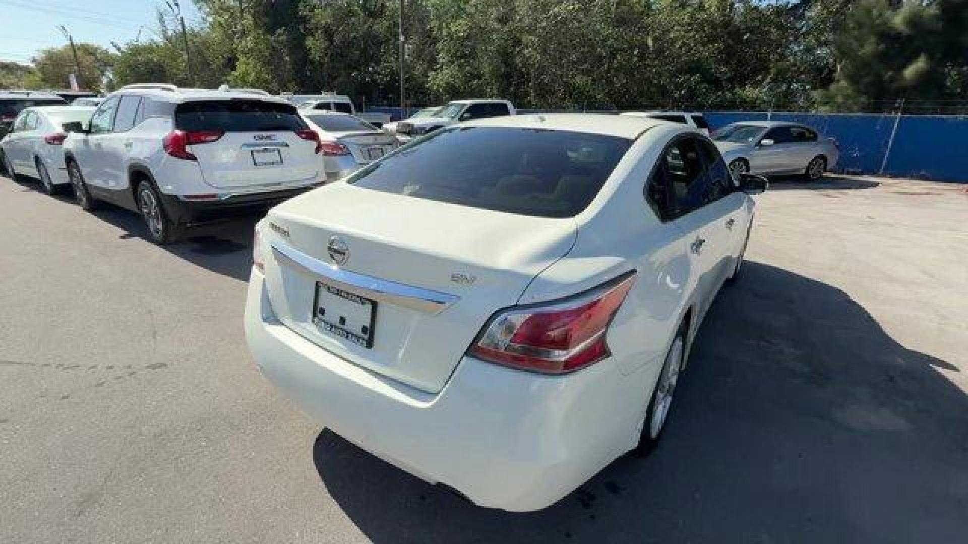 2015 Pearl White /Beige Nissan Altima (1N4AL3AP7FC) with an 4 2.5 L engine, Variable transmission, located at 27610 S Dixie Hwy, Homestead, FL, 33032, (305) 749-2348, 25.510241, -80.438301 - IIHS Top Safety Pick, Top Safety Pick+. Delivers 38 Highway MPG and 27 City MPG! This Nissan Altima boasts a Regular Unleaded I-4 2.5 L/152 engine powering this Variable transmission. PEARL WHITE, BEIGE, CLOTH SEAT TRIM, [Z66] ACTIVATION DISCLAIMER.*This Nissan Altima Comes Equipped with These Optio - Photo#2