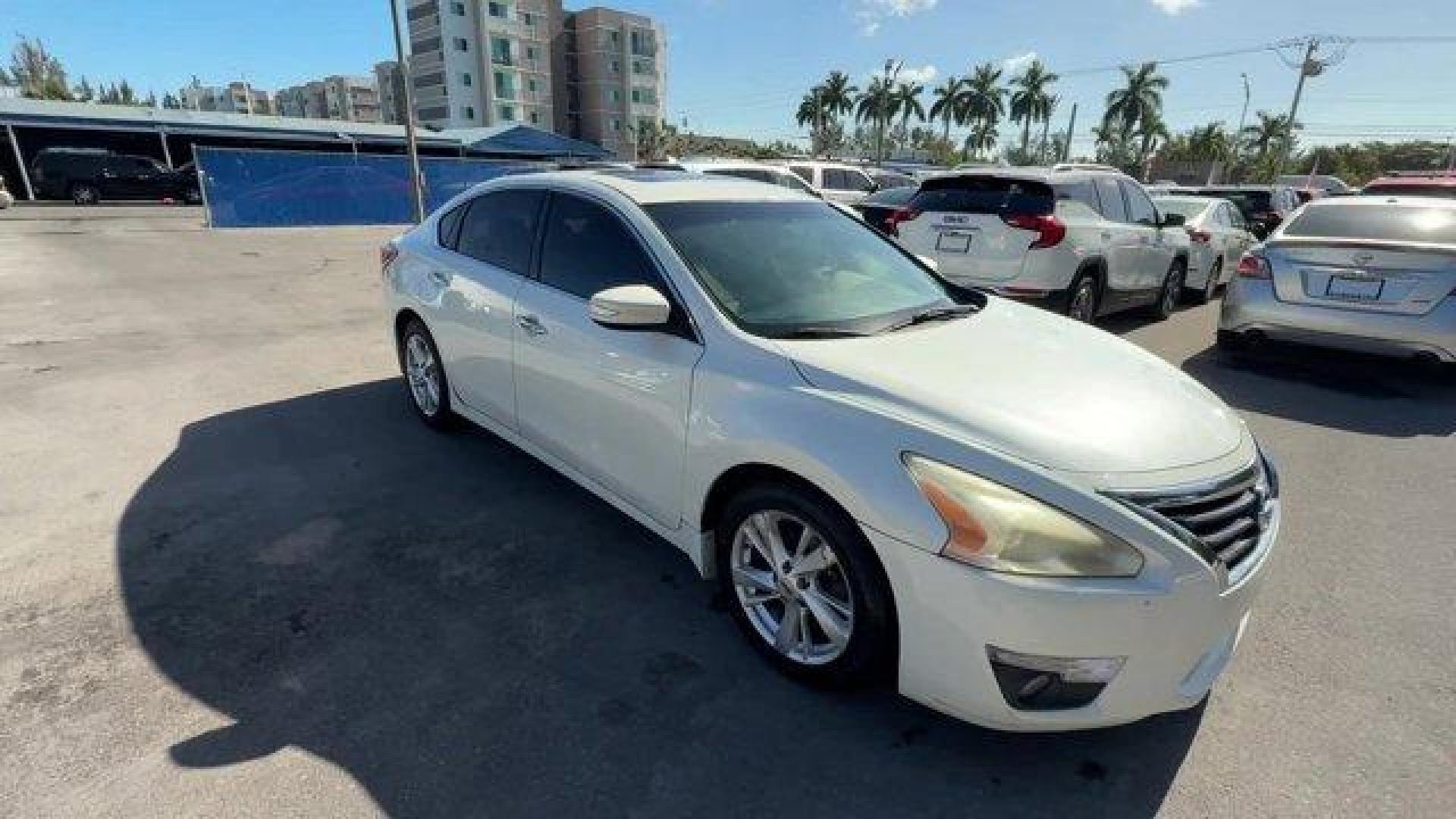 2015 Pearl White /Beige Nissan Altima (1N4AL3AP7FC) with an 4 2.5 L engine, Variable transmission, located at 27610 S Dixie Hwy, Homestead, FL, 33032, (305) 749-2348, 25.510241, -80.438301 - IIHS Top Safety Pick, Top Safety Pick+. Delivers 38 Highway MPG and 27 City MPG! This Nissan Altima boasts a Regular Unleaded I-4 2.5 L/152 engine powering this Variable transmission. PEARL WHITE, BEIGE, CLOTH SEAT TRIM, [Z66] ACTIVATION DISCLAIMER.*This Nissan Altima Comes Equipped with These Optio - Photo#4