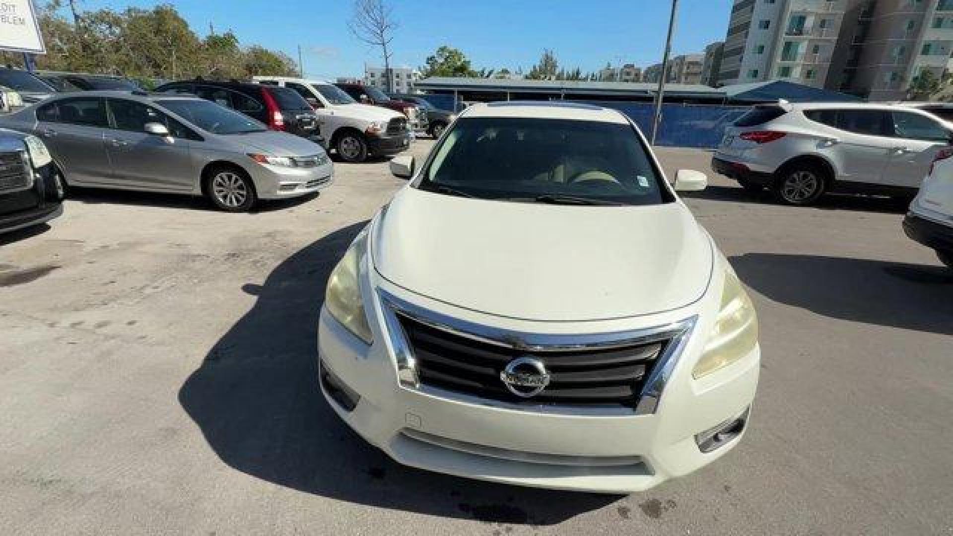 2015 Pearl White /Beige Nissan Altima (1N4AL3AP7FC) with an 4 2.5 L engine, Variable transmission, located at 27610 S Dixie Hwy, Homestead, FL, 33032, (305) 749-2348, 25.510241, -80.438301 - IIHS Top Safety Pick, Top Safety Pick+. Delivers 38 Highway MPG and 27 City MPG! This Nissan Altima boasts a Regular Unleaded I-4 2.5 L/152 engine powering this Variable transmission. PEARL WHITE, BEIGE, CLOTH SEAT TRIM, [Z66] ACTIVATION DISCLAIMER.*This Nissan Altima Comes Equipped with These Optio - Photo#5