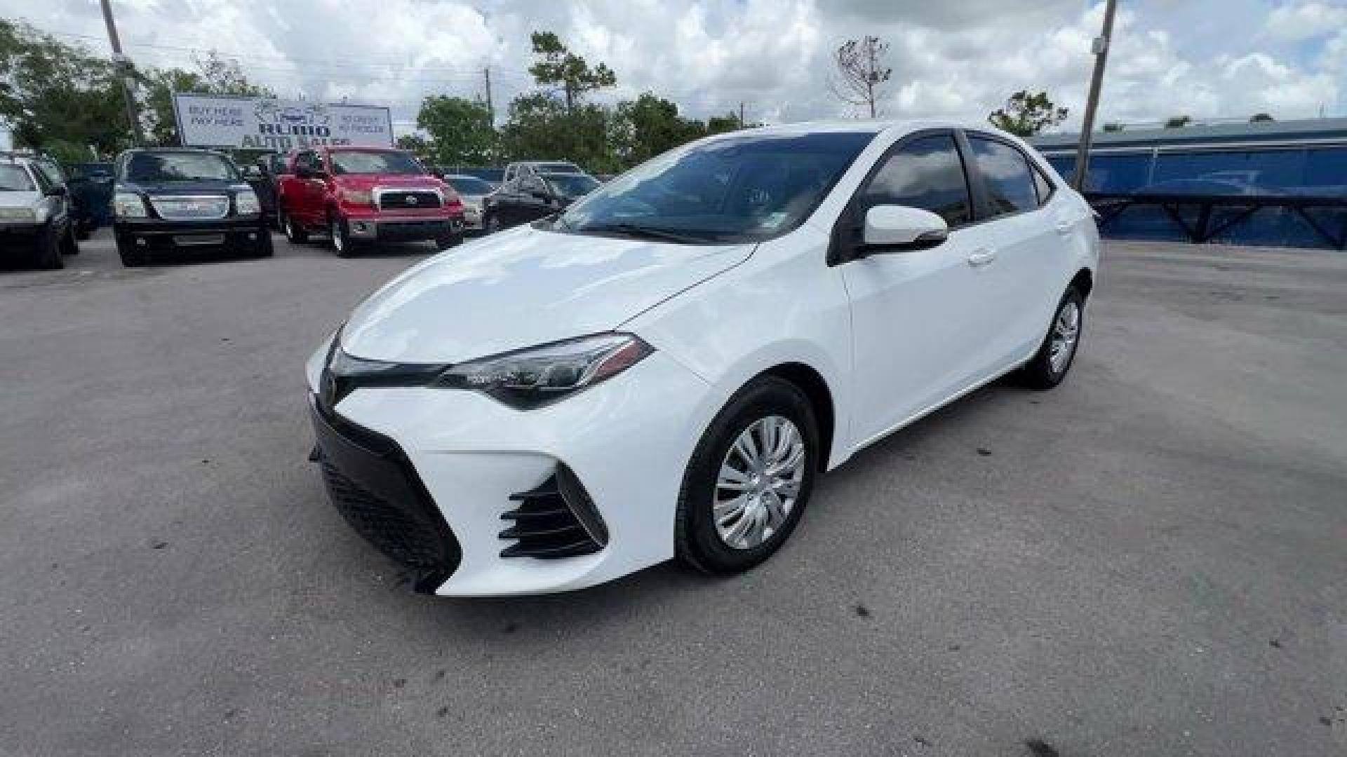 2017 White Toyota Corolla L (2T1BURHE8HC) with an 4 1.8 L engine, Variable transmission, located at 27610 S Dixie Hwy, Homestead, FL, 33032, (305) 749-2348, 25.510241, -80.438301 - KBB.com 5-Year Cost to Own Awards. This Toyota Corolla delivers a Regular Unleaded I-4 1.8 L/110 engine powering this Variable transmission. Urethane Gear Shifter Material, Trunk Rear Cargo Access, Trip Computer.* This Toyota Corolla Features the Following Options *Transmission: Continuously Variabl - Photo#0