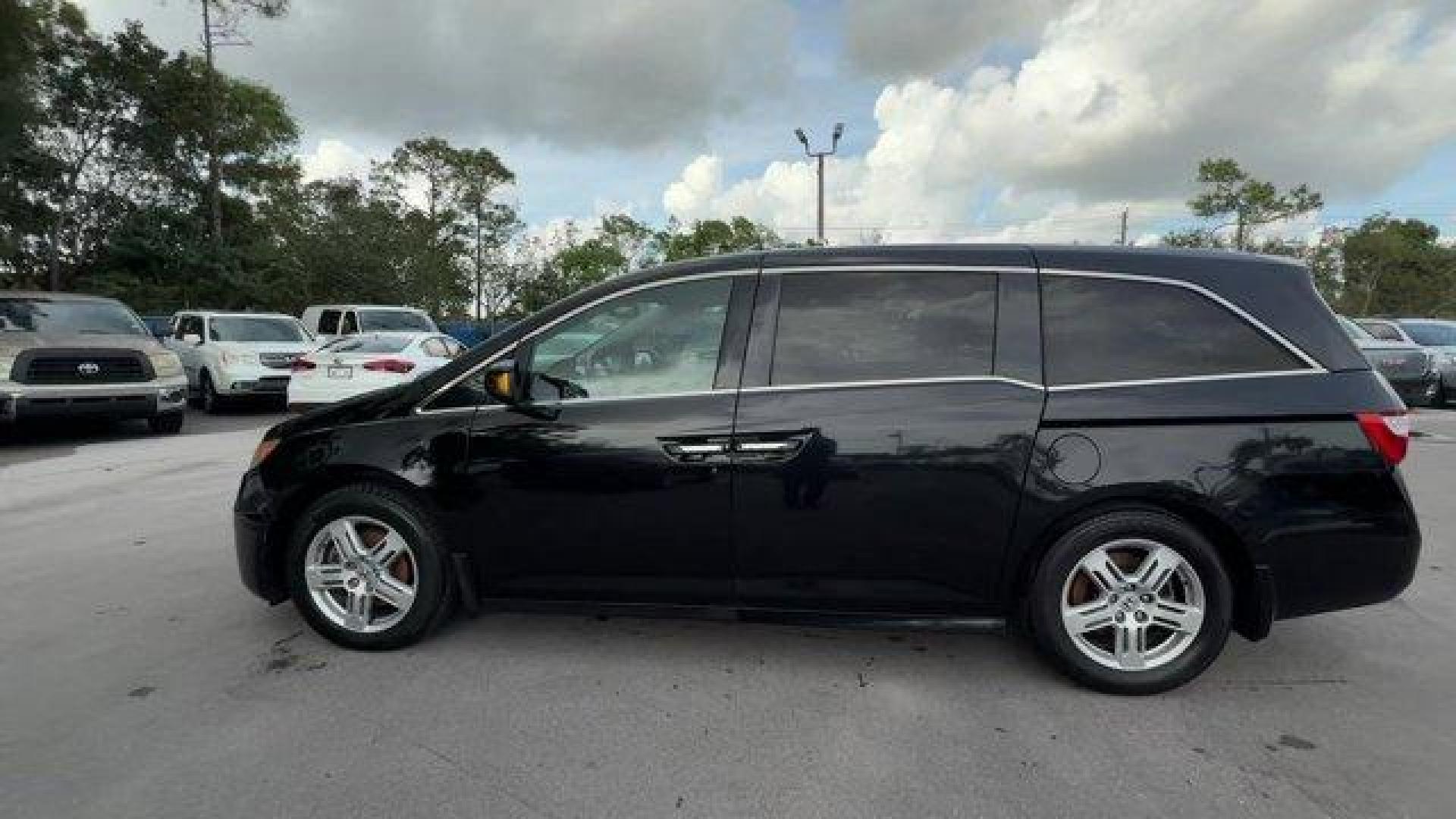 2013 Black Honda Odyssey (5FNRL5H97DB) with an 6 3.5L engine, Automatic transmission, located at 27610 S Dixie Hwy, Homestead, FL, 33032, (305) 749-2348, 25.510241, -80.438301 - KBB.com 10 Best Family Cars. Only 119,824 Miles! Boasts 28 Highway MPG and 19 City MPG! This Honda Odyssey boasts a Gas V6 3.5L/212 engine powering this Automatic transmission. XM Radio (subscription required), Wide-mode adjustable 2nd-row seats -inc: leather trimmed outboard seats, multi-function c - Photo#1