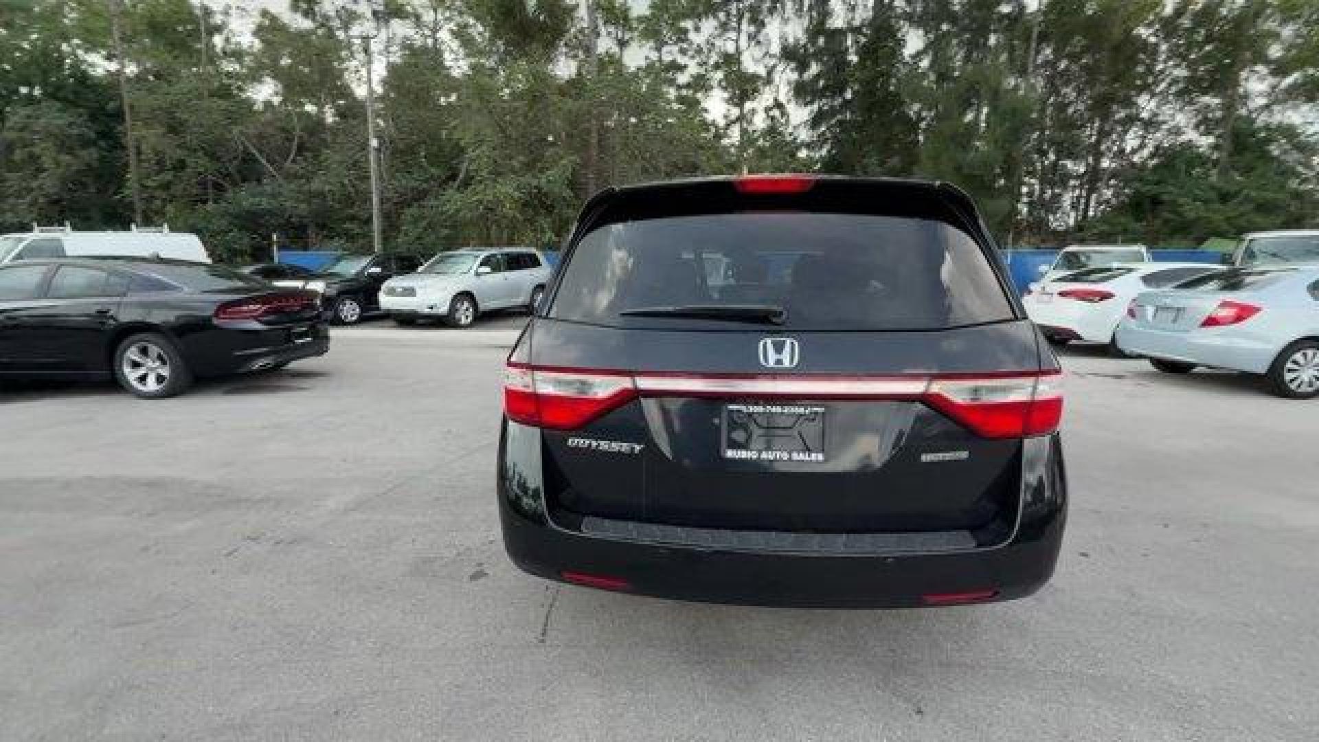 2013 Black Honda Odyssey (5FNRL5H97DB) with an 6 3.5L engine, Automatic transmission, located at 27610 S Dixie Hwy, Homestead, FL, 33032, (305) 749-2348, 25.510241, -80.438301 - KBB.com 10 Best Family Cars. Only 119,824 Miles! Boasts 28 Highway MPG and 19 City MPG! This Honda Odyssey boasts a Gas V6 3.5L/212 engine powering this Automatic transmission. XM Radio (subscription required), Wide-mode adjustable 2nd-row seats -inc: leather trimmed outboard seats, multi-function c - Photo#3