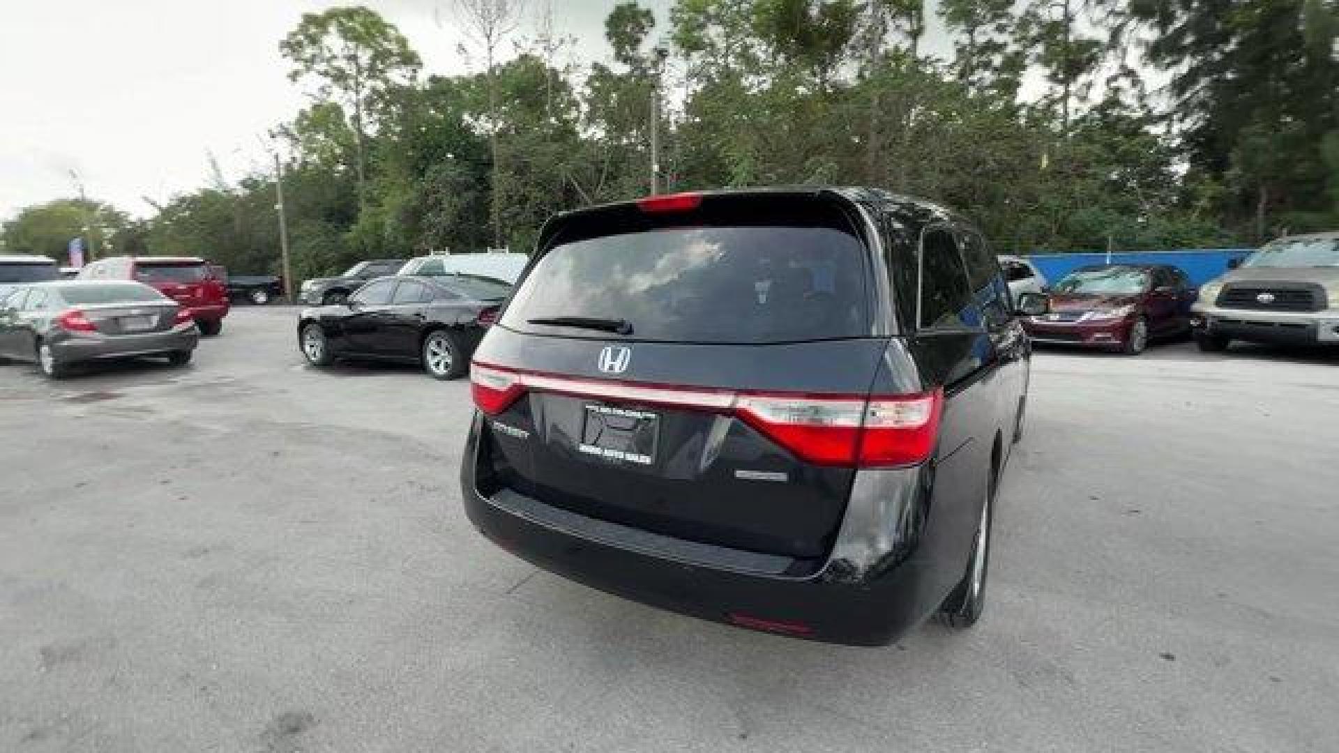 2013 Black Honda Odyssey (5FNRL5H97DB) with an 6 3.5L engine, Automatic transmission, located at 27610 S Dixie Hwy, Homestead, FL, 33032, (305) 749-2348, 25.510241, -80.438301 - KBB.com 10 Best Family Cars. Only 119,824 Miles! Boasts 28 Highway MPG and 19 City MPG! This Honda Odyssey boasts a Gas V6 3.5L/212 engine powering this Automatic transmission. XM Radio (subscription required), Wide-mode adjustable 2nd-row seats -inc: leather trimmed outboard seats, multi-function c - Photo#4