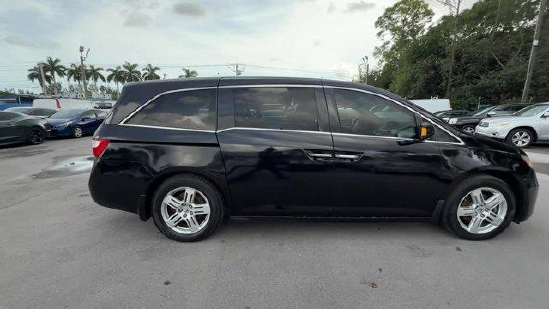 2013 Black Honda Odyssey (5FNRL5H97DB) with an 6 3.5L engine, Automatic transmission, located at 27610 S Dixie Hwy, Homestead, FL, 33032, (305) 749-2348, 25.510241, -80.438301 - KBB.com 10 Best Family Cars. Only 119,824 Miles! Boasts 28 Highway MPG and 19 City MPG! This Honda Odyssey boasts a Gas V6 3.5L/212 engine powering this Automatic transmission. XM Radio (subscription required), Wide-mode adjustable 2nd-row seats -inc: leather trimmed outboard seats, multi-function c - Photo#5