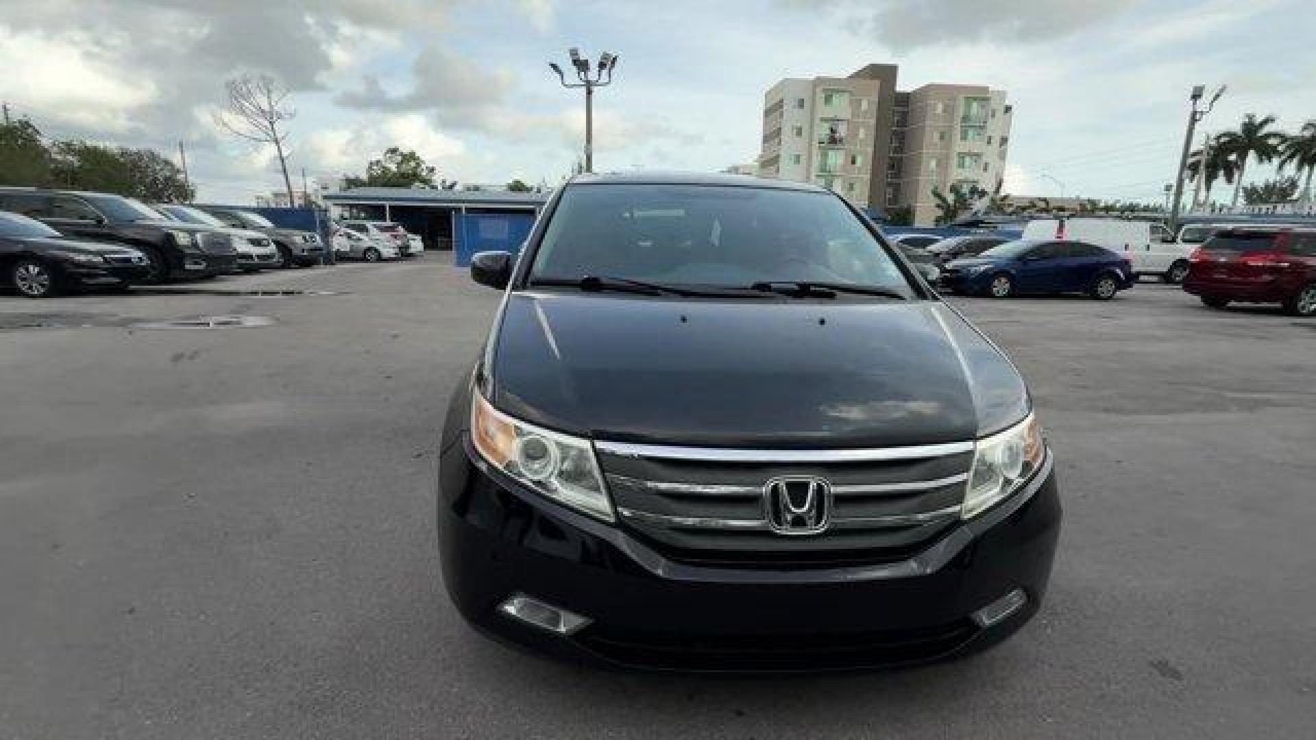 2013 Black Honda Odyssey (5FNRL5H97DB) with an 6 3.5L engine, Automatic transmission, located at 27610 S Dixie Hwy, Homestead, FL, 33032, (305) 749-2348, 25.510241, -80.438301 - KBB.com 10 Best Family Cars. Only 119,824 Miles! Boasts 28 Highway MPG and 19 City MPG! This Honda Odyssey boasts a Gas V6 3.5L/212 engine powering this Automatic transmission. XM Radio (subscription required), Wide-mode adjustable 2nd-row seats -inc: leather trimmed outboard seats, multi-function c - Photo#7