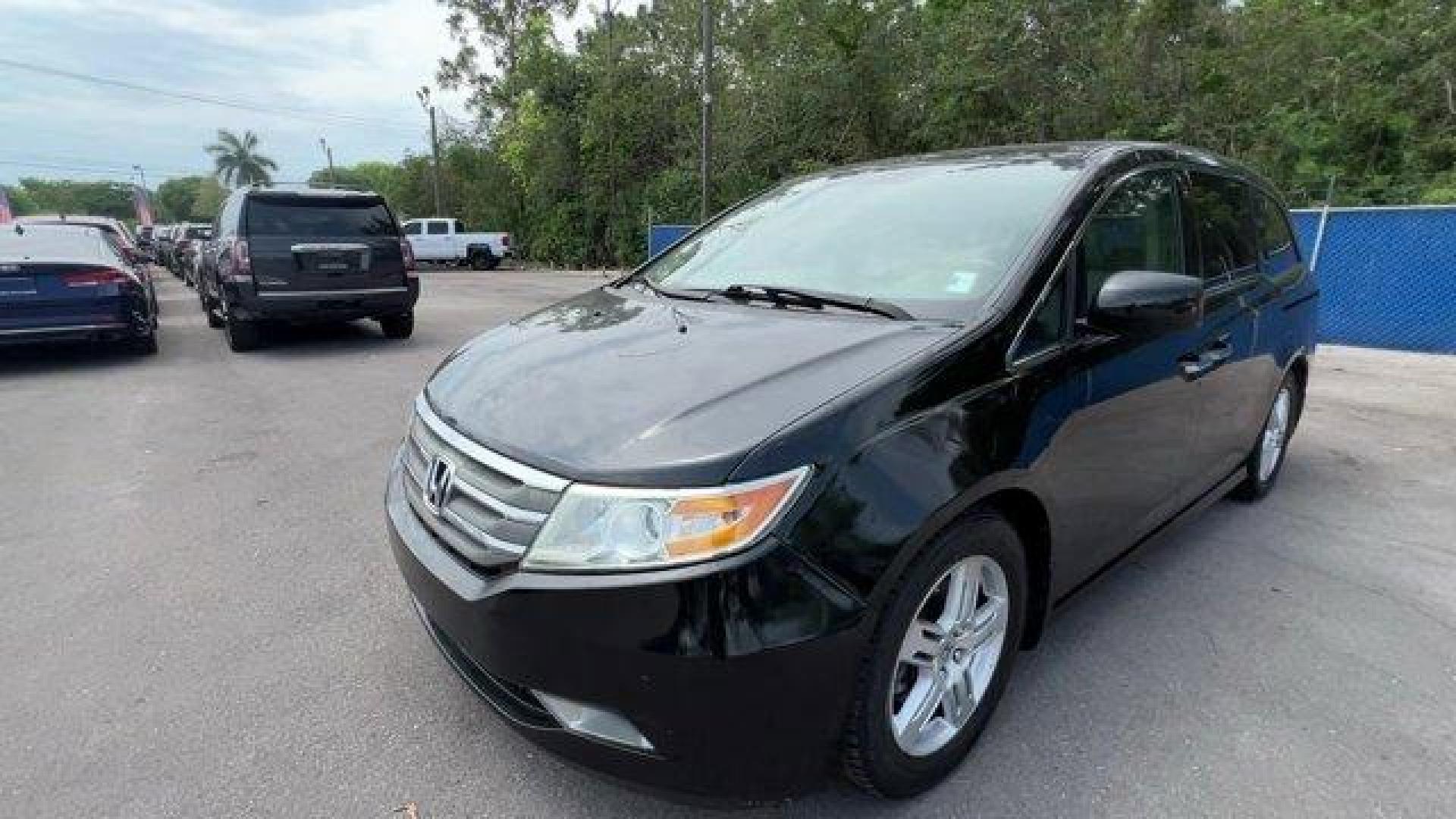 2013 Black Honda Odyssey (5FNRL5H97DB) with an 6 3.5L engine, Automatic transmission, located at 27610 S Dixie Hwy, Homestead, FL, 33032, (305) 749-2348, 25.510241, -80.438301 - KBB.com 10 Best Family Cars. Only 119,824 Miles! Boasts 28 Highway MPG and 19 City MPG! This Honda Odyssey boasts a Gas V6 3.5L/212 engine powering this Automatic transmission. XM Radio (subscription required), Wide-mode adjustable 2nd-row seats -inc: leather trimmed outboard seats, multi-function c - Photo#0