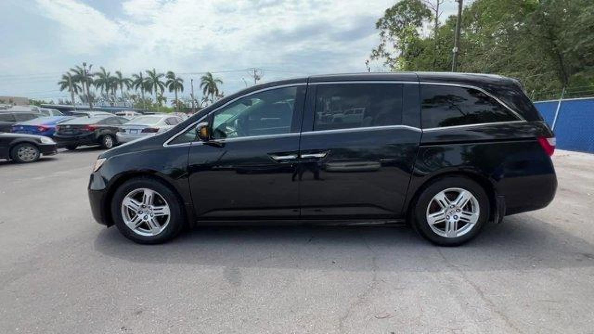 2013 Black Honda Odyssey (5FNRL5H97DB) with an 6 3.5L engine, Automatic transmission, located at 27610 S Dixie Hwy, Homestead, FL, 33032, (305) 749-2348, 25.510241, -80.438301 - KBB.com 10 Best Family Cars. Only 119,824 Miles! Boasts 28 Highway MPG and 19 City MPG! This Honda Odyssey boasts a Gas V6 3.5L/212 engine powering this Automatic transmission. XM Radio (subscription required), Wide-mode adjustable 2nd-row seats -inc: leather trimmed outboard seats, multi-function c - Photo#1
