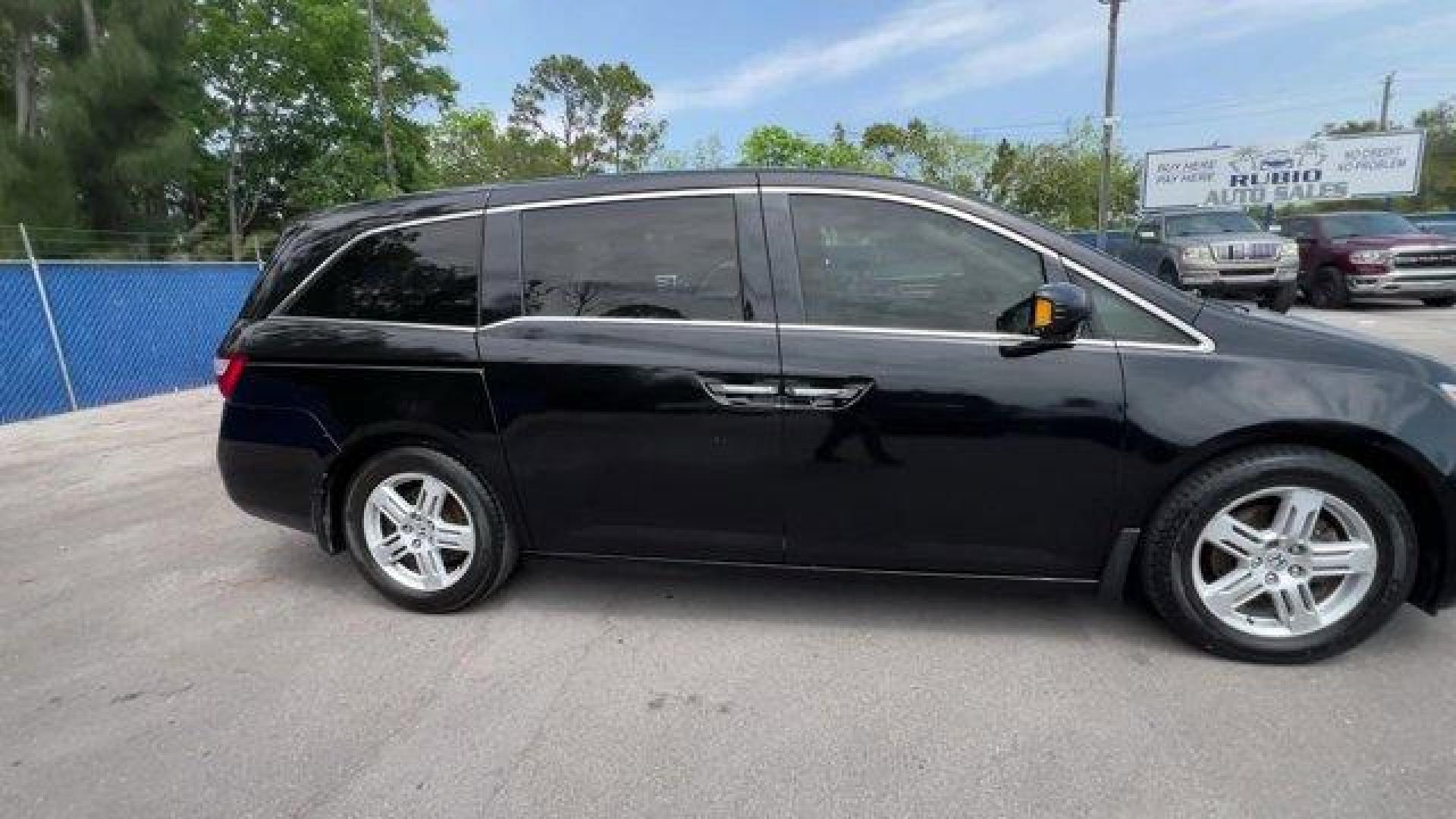 2013 Black Honda Odyssey (5FNRL5H97DB) with an 6 3.5L engine, Automatic transmission, located at 27610 S Dixie Hwy, Homestead, FL, 33032, (305) 749-2348, 25.510241, -80.438301 - KBB.com 10 Best Family Cars. Only 119,824 Miles! Boasts 28 Highway MPG and 19 City MPG! This Honda Odyssey boasts a Gas V6 3.5L/212 engine powering this Automatic transmission. XM Radio (subscription required), Wide-mode adjustable 2nd-row seats -inc: leather trimmed outboard seats, multi-function c - Photo#5