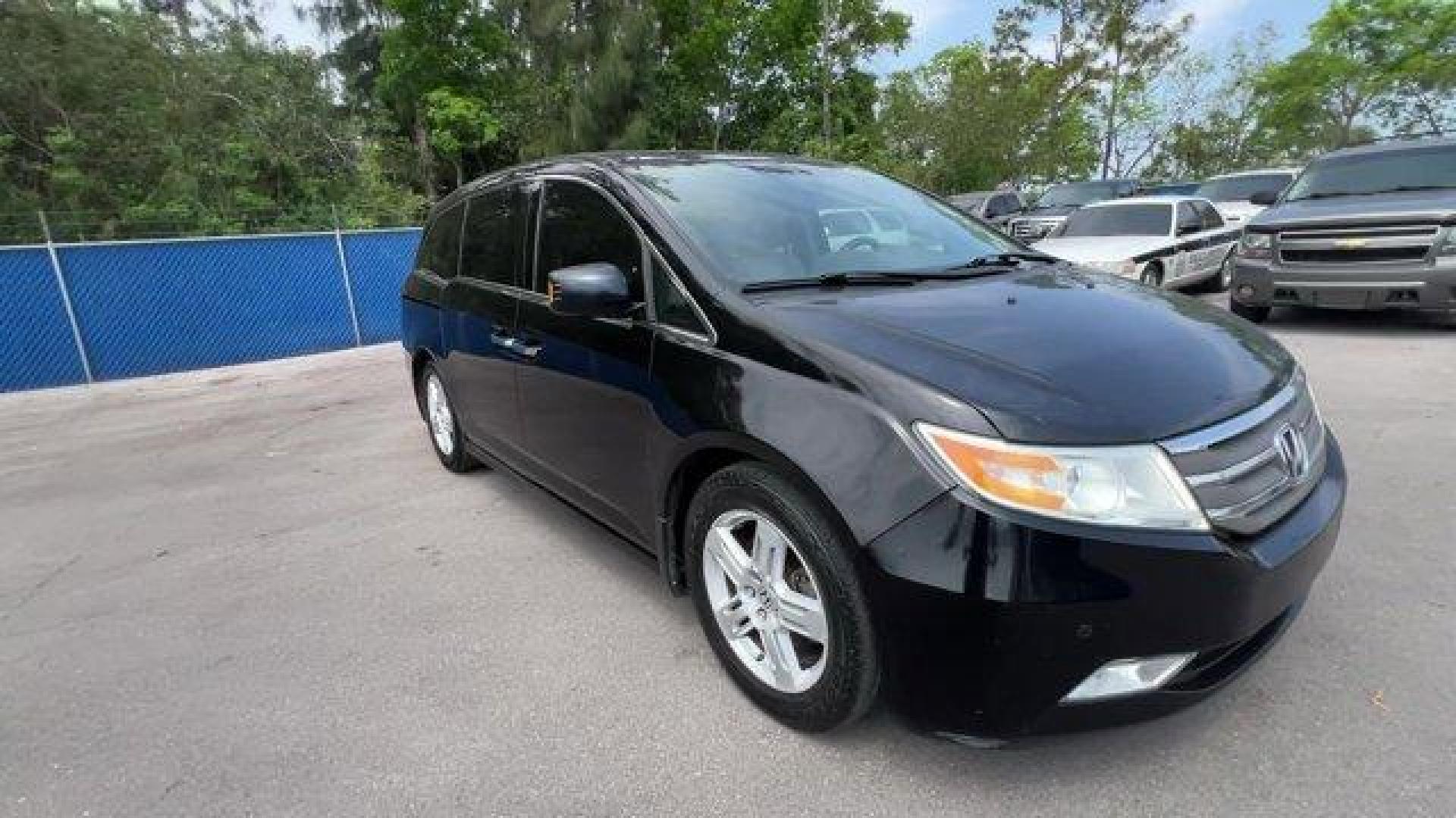 2013 Black Honda Odyssey (5FNRL5H97DB) with an 6 3.5L engine, Automatic transmission, located at 27610 S Dixie Hwy, Homestead, FL, 33032, (305) 749-2348, 25.510241, -80.438301 - KBB.com 10 Best Family Cars. Only 119,824 Miles! Boasts 28 Highway MPG and 19 City MPG! This Honda Odyssey boasts a Gas V6 3.5L/212 engine powering this Automatic transmission. XM Radio (subscription required), Wide-mode adjustable 2nd-row seats -inc: leather trimmed outboard seats, multi-function c - Photo#6
