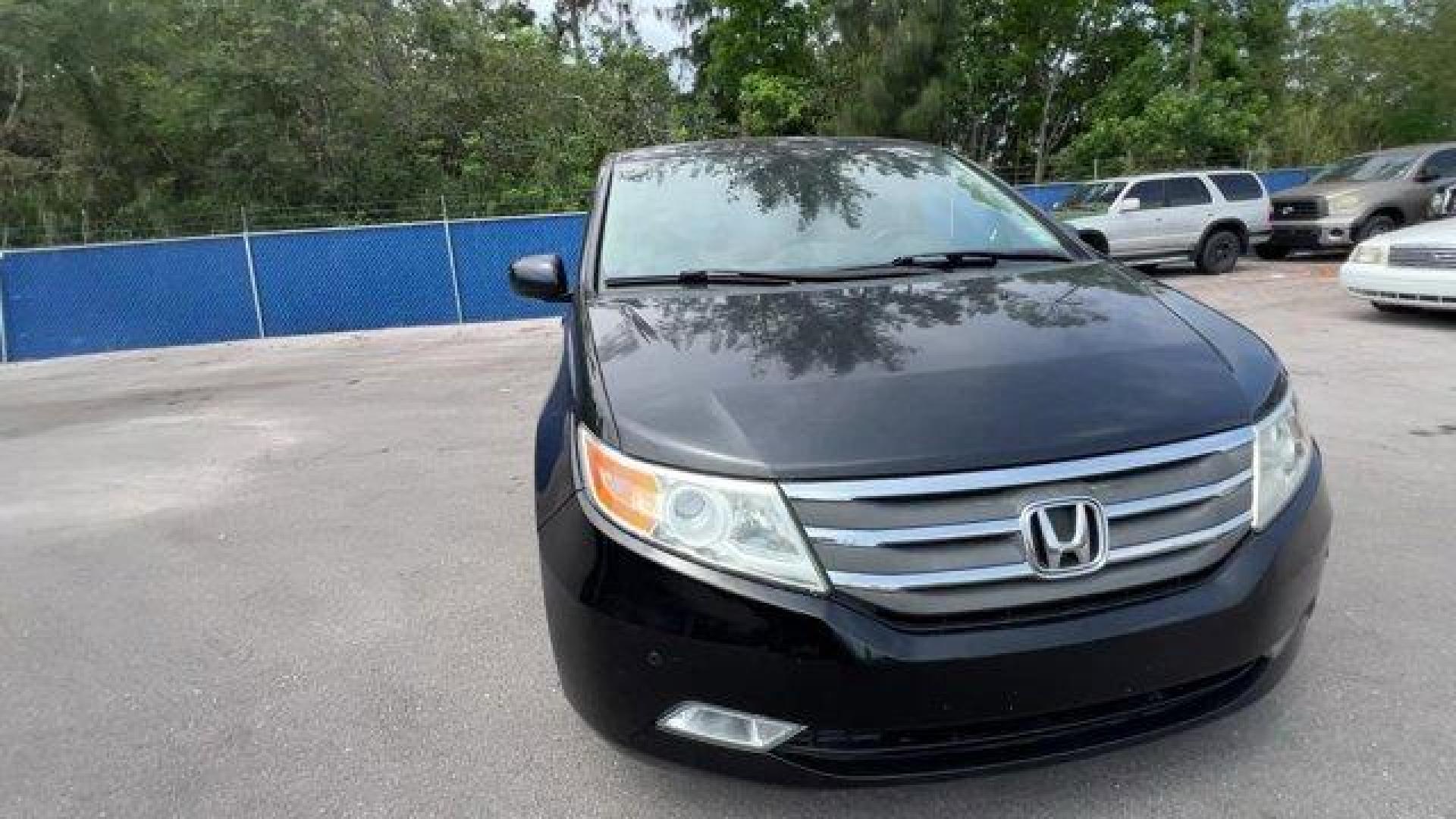 2013 Black Honda Odyssey (5FNRL5H97DB) with an 6 3.5L engine, Automatic transmission, located at 27610 S Dixie Hwy, Homestead, FL, 33032, (305) 749-2348, 25.510241, -80.438301 - KBB.com 10 Best Family Cars. Only 119,824 Miles! Boasts 28 Highway MPG and 19 City MPG! This Honda Odyssey boasts a Gas V6 3.5L/212 engine powering this Automatic transmission. XM Radio (subscription required), Wide-mode adjustable 2nd-row seats -inc: leather trimmed outboard seats, multi-function c - Photo#7