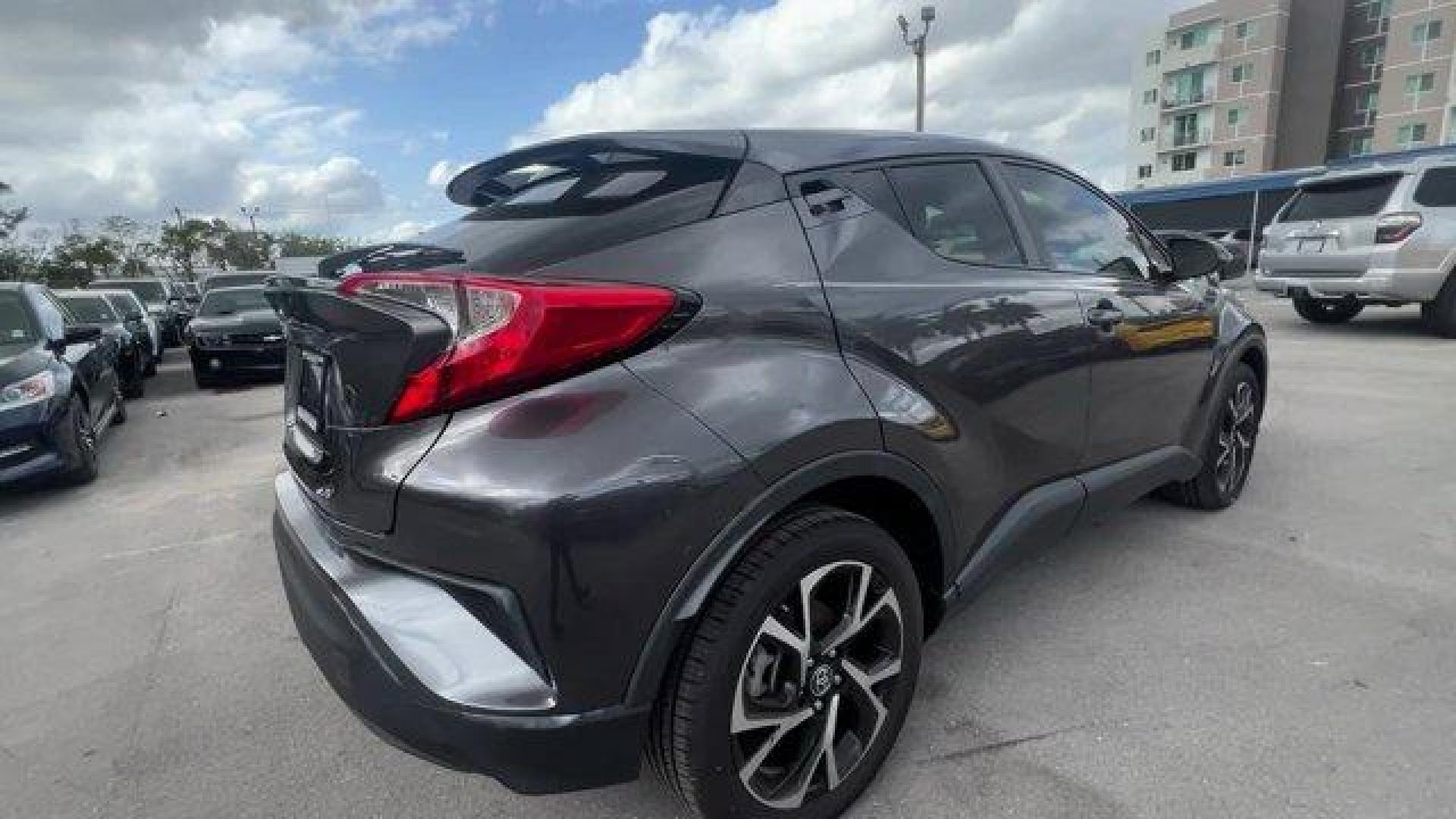 2020 Gray Toyota C-HR (JTNKHMBX7L1) with an 4 2.0 L engine, Variable transmission, located at 27610 S Dixie Hwy, Homestead, FL, 33032, (305) 749-2348, 25.510241, -80.438301 - Only 40,808 Miles! Scores 31 Highway MPG and 27 City MPG! This Toyota C-HR delivers a Regular Unleaded I-4 2.0 L/121 engine powering this Variable transmission. VSC Electronic Stability Control (ESC), Variable Intermittent Wipers, Trip Computer.*This Toyota C-HR Comes Equipped with These Options *Tr - Photo#4