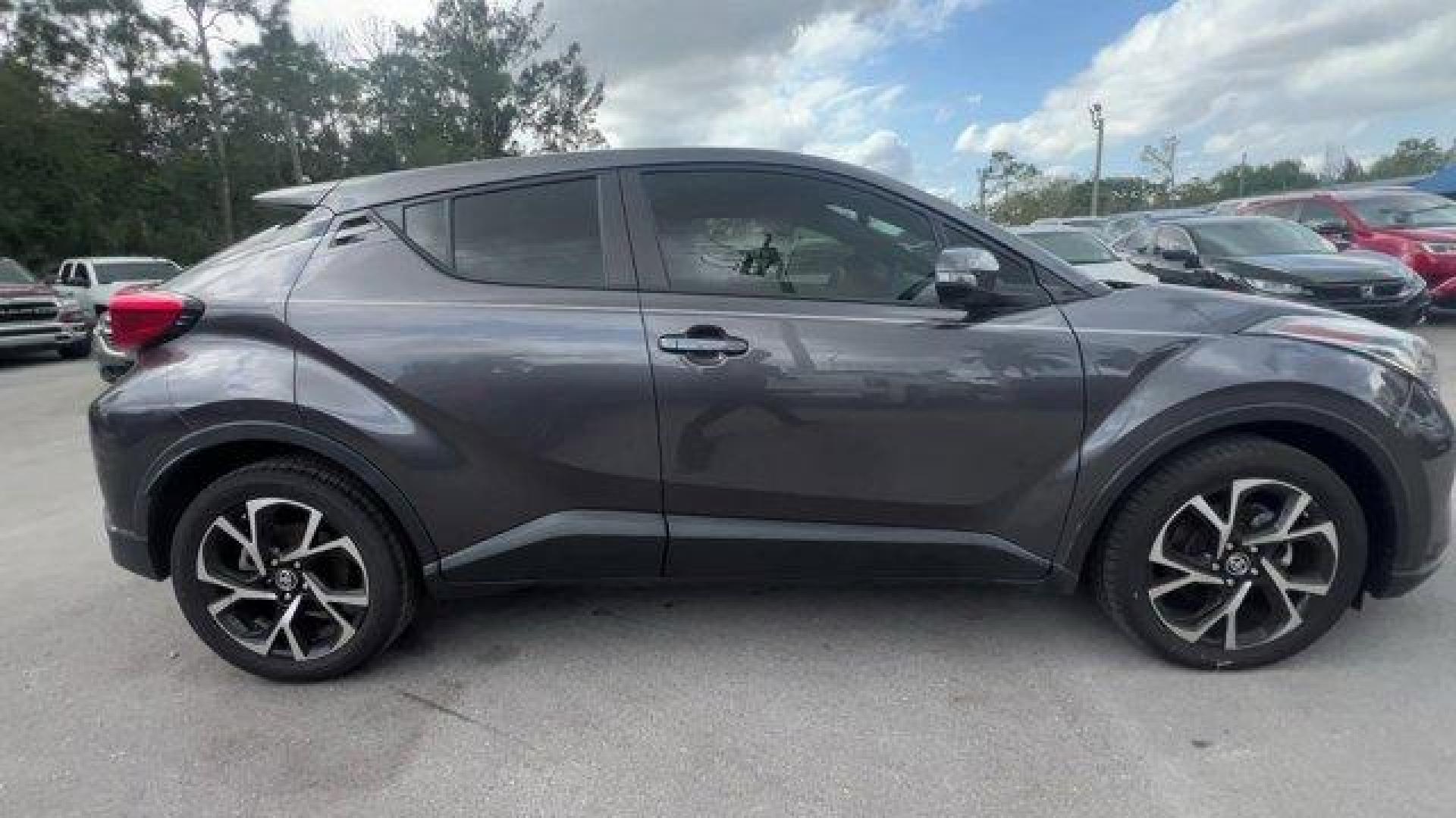 2020 Gray Toyota C-HR (JTNKHMBX7L1) with an 4 2.0 L engine, Variable transmission, located at 27610 S Dixie Hwy, Homestead, FL, 33032, (305) 749-2348, 25.510241, -80.438301 - Only 40,808 Miles! Scores 31 Highway MPG and 27 City MPG! This Toyota C-HR delivers a Regular Unleaded I-4 2.0 L/121 engine powering this Variable transmission. VSC Electronic Stability Control (ESC), Variable Intermittent Wipers, Trip Computer.*This Toyota C-HR Comes Equipped with These Options *Tr - Photo#5