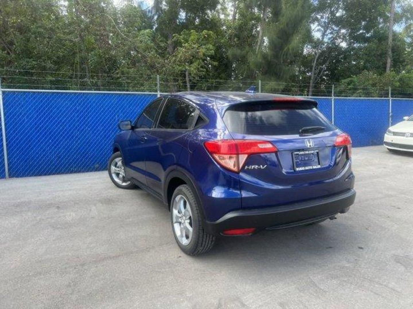 2016 Blue Honda HR-V LX (3CZRU5H34GM) with an 4 1.8 L engine, Variable transmission, located at 27610 S Dixie Hwy, Homestead, FL, 33032, (305) 749-2348, 25.510241, -80.438301 - Green Car Journal 2016 Green SUV of the Year. Delivers 35 Highway MPG and 28 City MPG! This Honda HR-V boasts a Regular Unleaded I-4 1.8 L/110 engine powering this Variable transmission. Wheels: 17 Alloy, VSA Electronic Stability Control (ESC), Urethane Gear Shifter Material.*This Honda HR-V Comes E - Photo#7