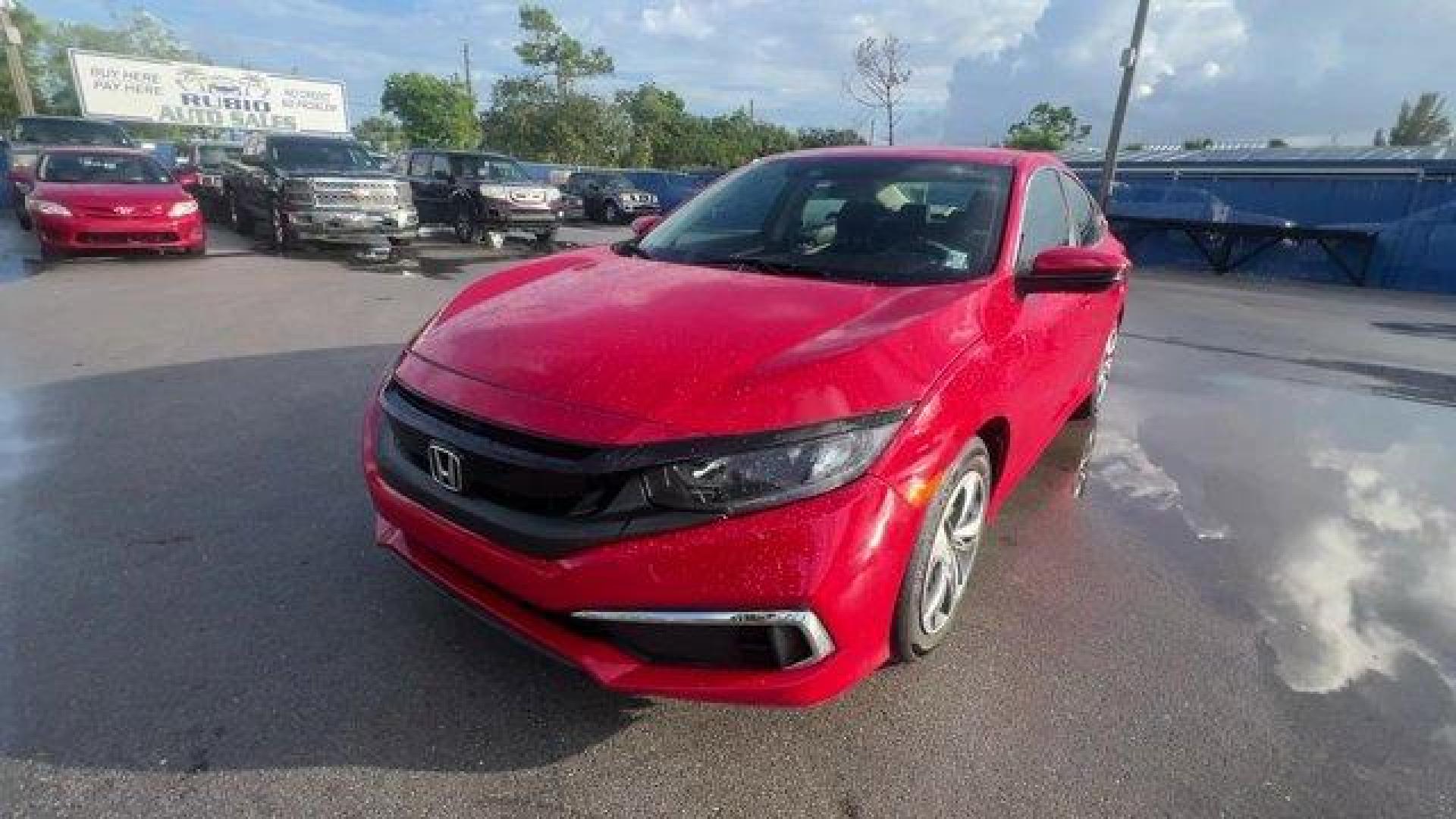 2019 Red Honda Civic Sedan LX (2HGFC2F66KH) with an 4 2.0 L engine, Variable transmission, located at 27610 S Dixie Hwy, Homestead, FL, 33032, (305) 749-2348, 25.510241, -80.438301 - Only 43,117 Miles! Delivers 38 Highway MPG and 30 City MPG! This Honda Civic Sedan delivers a Regular Unleaded I-4 2.0 L/122 engine powering this Variable transmission. Window Grid Antenna, Wheels: 16 w/Full Covers, VSA Electronic Stability Control (ESC).*This Honda Civic Sedan Comes Equipped with T - Photo#0