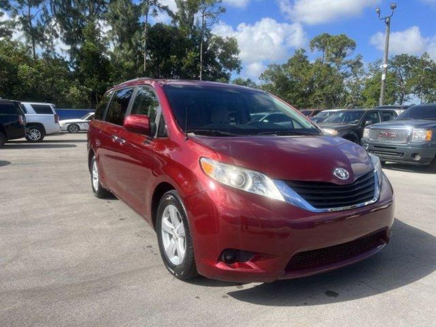 2011 Red Toyota Sienna Base (5TDKK3DC2BS) with an 6 3.5L engine, Automatic transmission, located at 27610 S Dixie Hwy, Homestead, FL, 33032, (305) 749-2348, 25.510241, -80.438301 - IIHS Top Safety Pick. Only 81,190 Miles! Scores 24 Highway MPG and 18 City MPG! This Toyota Sienna boasts a Gas V6 3.5L/211 engine powering this Automatic transmission. XM satellite radio (subscription required), Washer-linked variable intermittent wipers -inc: de-icer grid, Vehicle stability contro - Photo#0